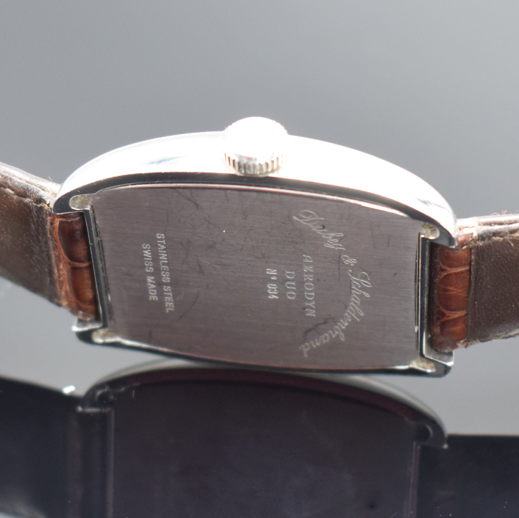 Detail c: DUBEY & SCHALDENBRAND Herrenarmbanduhr Aerodyn Duo, Automatik, Schweiz um 2000, tonneauförmiges Edelstahlgeh. inkl. orig. Lederband m. orig. ...