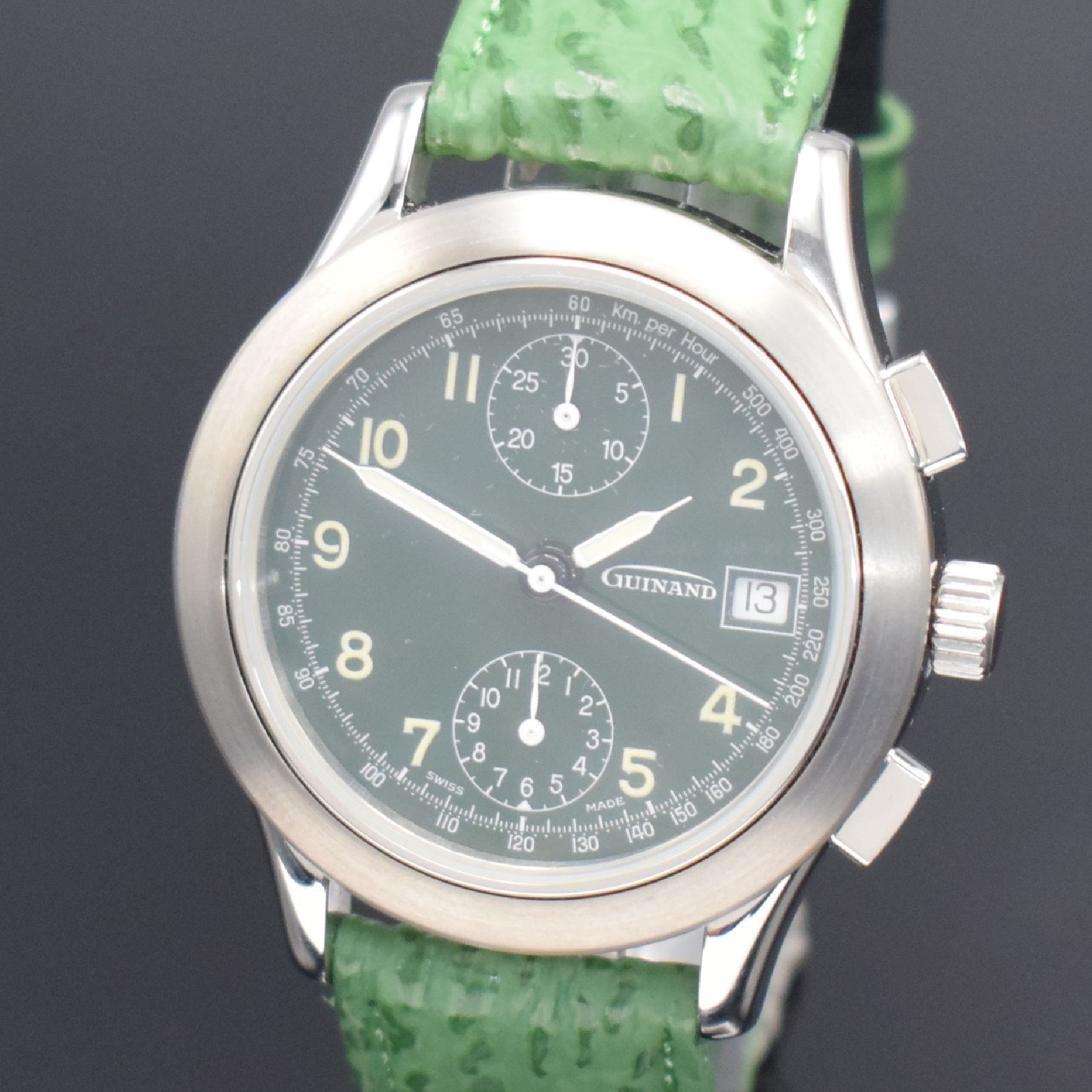 Detail a: GUINAND nahezu neuwertige Herrenarmbanduhr mit Chronograph, Schweiz um 2000, Automatik, verschr. Geh. in Edelstahl, grünes Zifferbl. m. arab. ...
