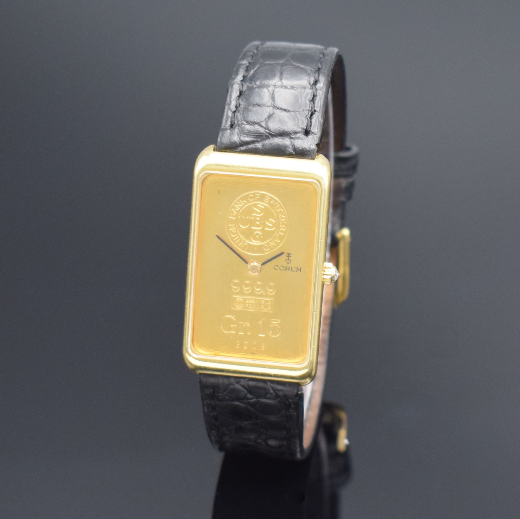 CORUM Herrengolduhr in Form eines 15g Feingoldbarrens Nr. 3209 Referenz 55400, Handaufzug, Schweiz für den US-Markt um 1978, Geh. massiv GG 750/000 ...