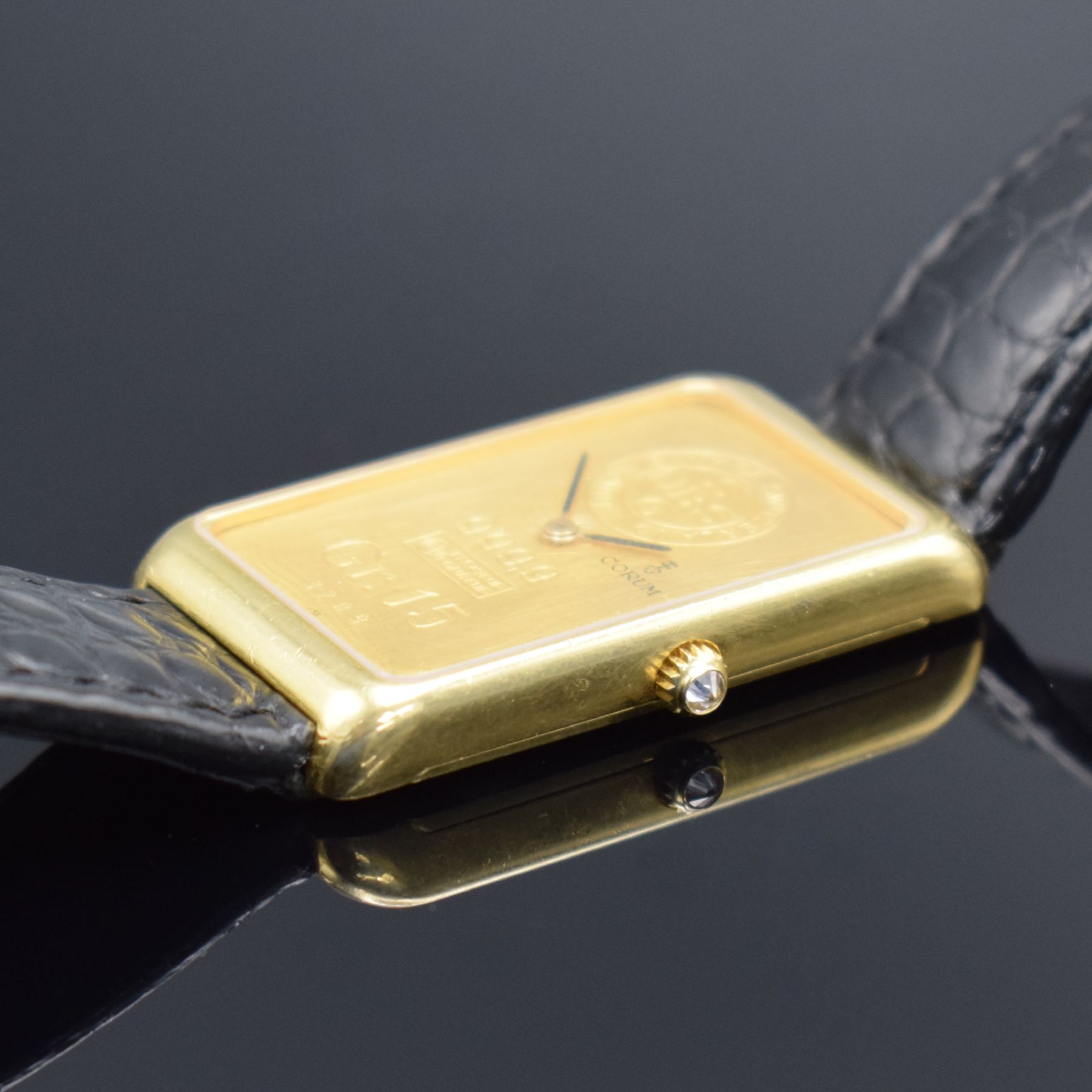 Detail b: CORUM Herrengolduhr in Form eines 15g Feingoldbarrens Nr. 3209 Referenz 55400, Handaufzug, Schweiz für den US-Markt um 1978, Geh. massiv GG 750/000 ...
