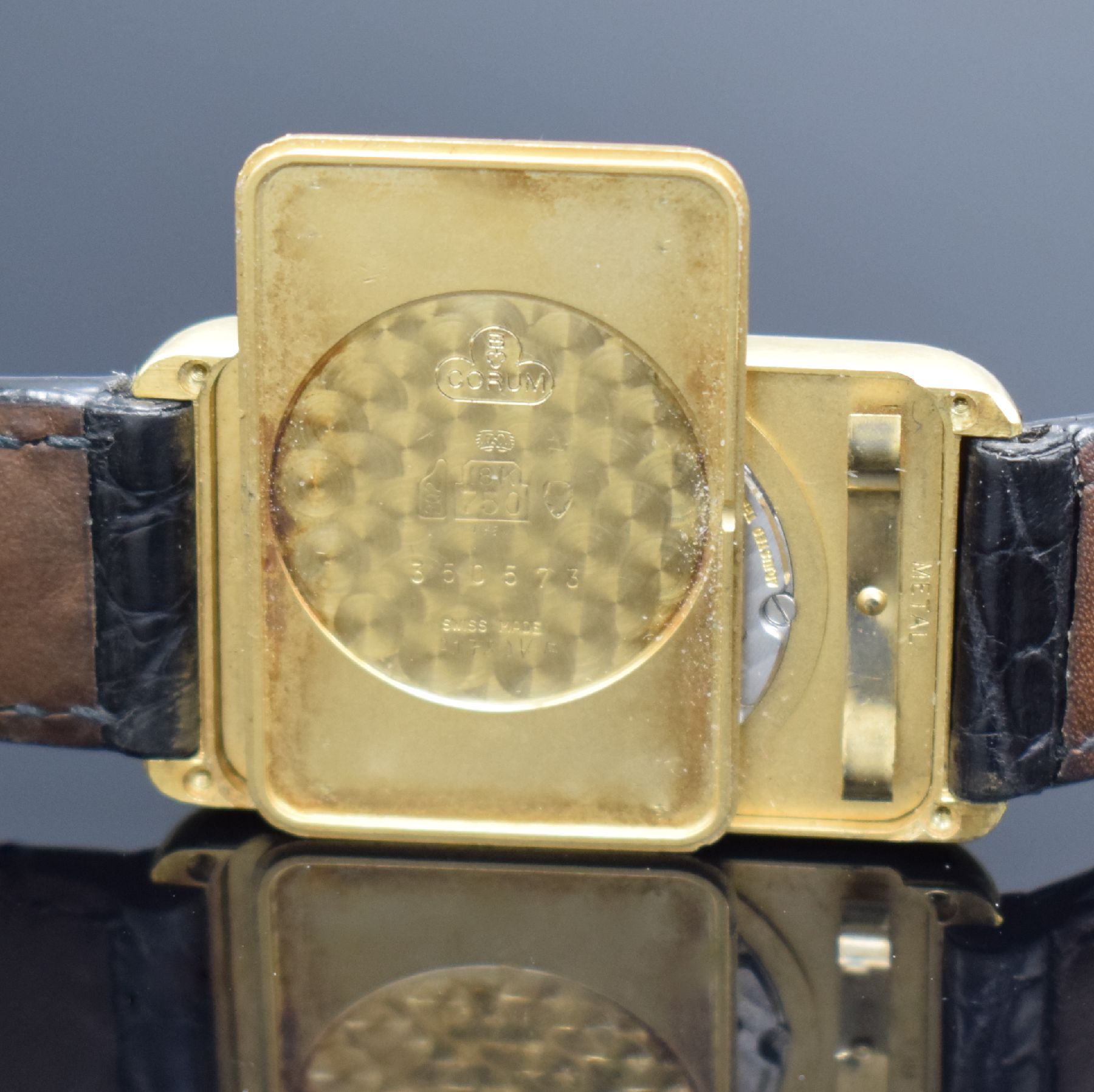 Detail f: CORUM Herrengolduhr in Form eines 15g Feingoldbarrens Nr. 3209 Referenz 55400, Handaufzug, Schweiz für den US-Markt um 1978, Geh. massiv GG 750/000 ...