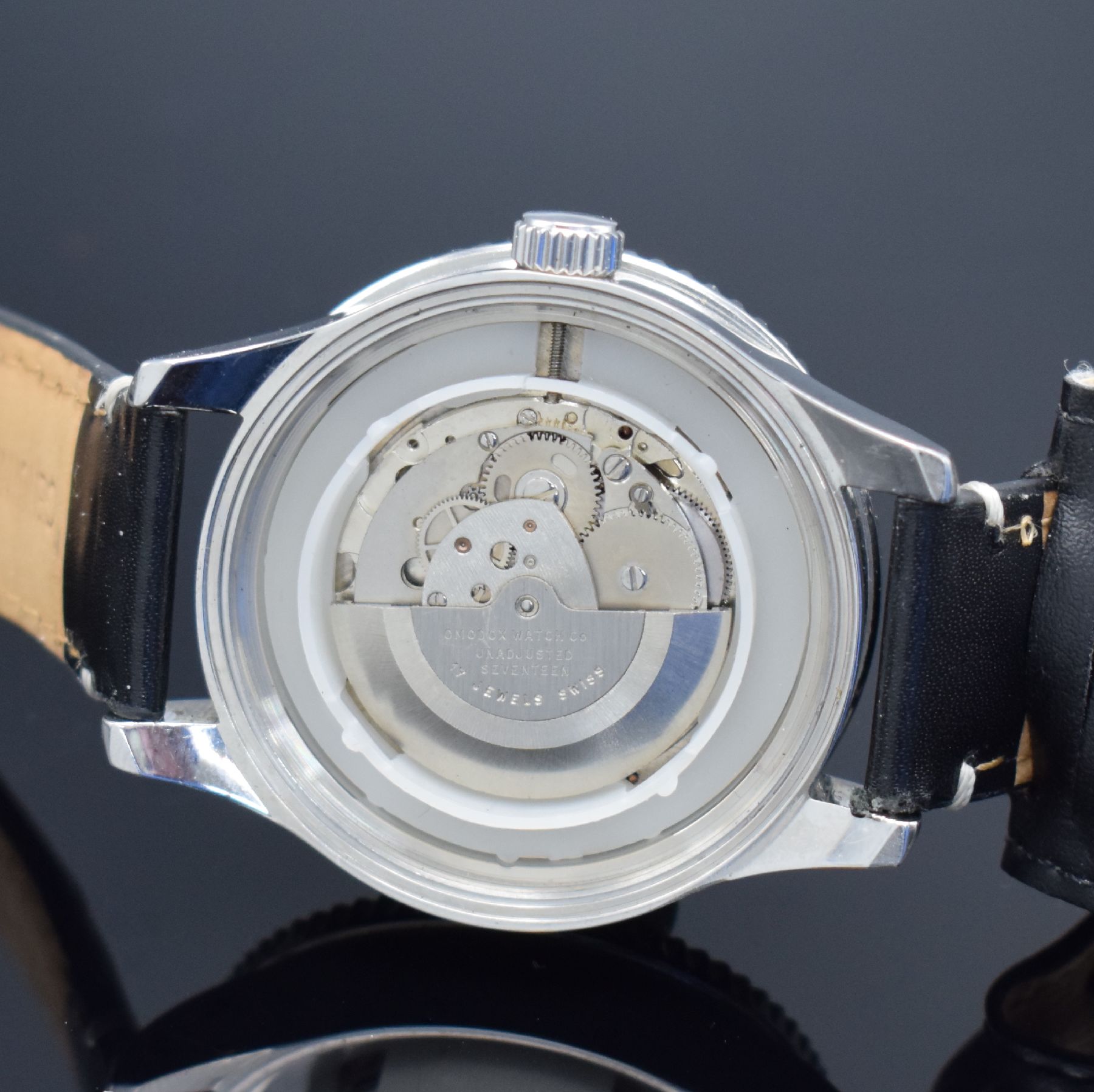 Detail d: ZENO-WATCH BASEL GMT Herrenarmbanduhr Kaliber AS 1913 in Stahl, Schweiz um 2010, Automatik, Boden & Krone verschr., orig. Lederband m. Dornschl., ...