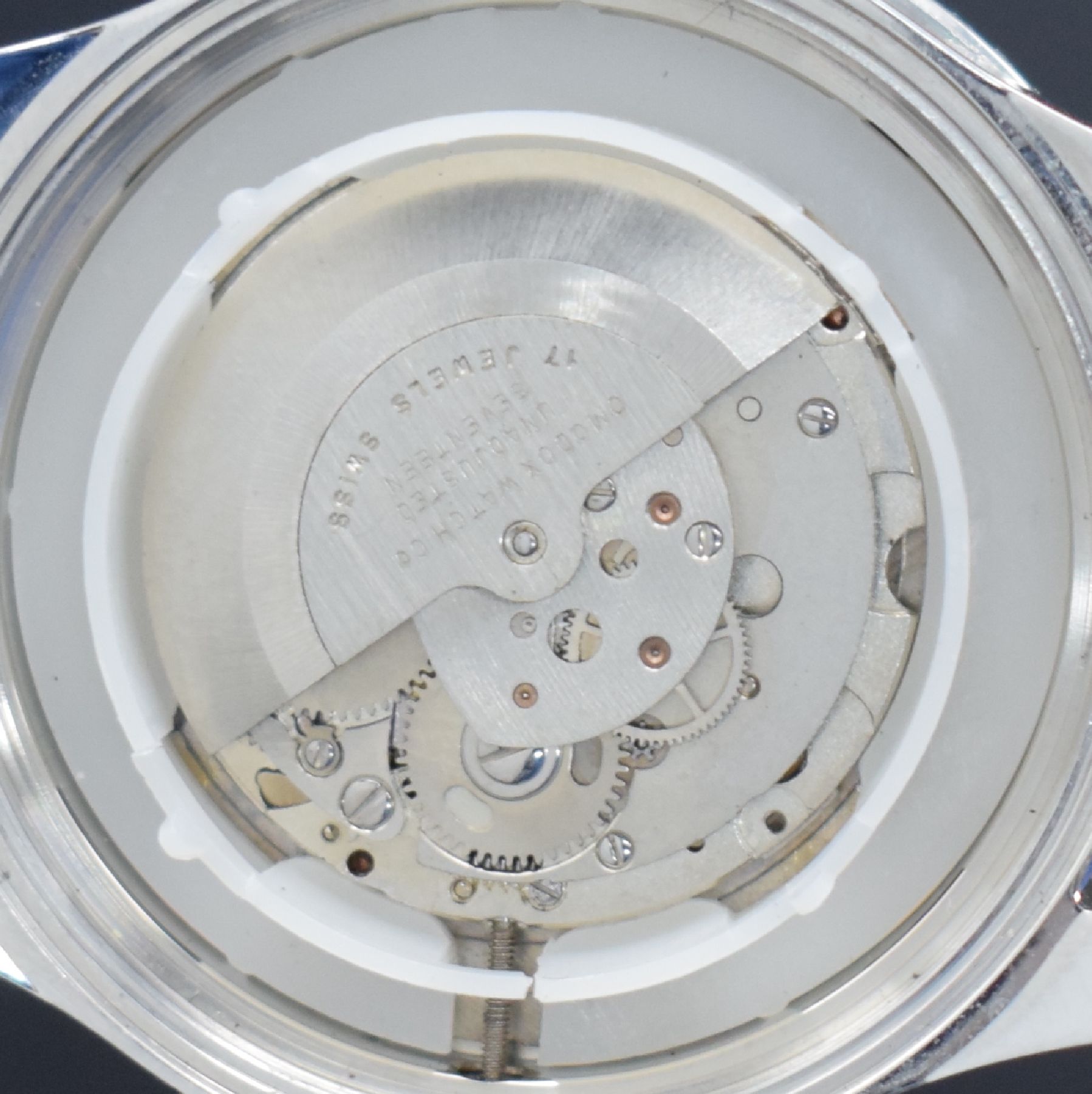 Detail e: ZENO-WATCH BASEL GMT Herrenarmbanduhr Kaliber AS 1913 in Stahl, Schweiz um 2010, Automatik, Boden & Krone verschr., orig. Lederband m. Dornschl., ...