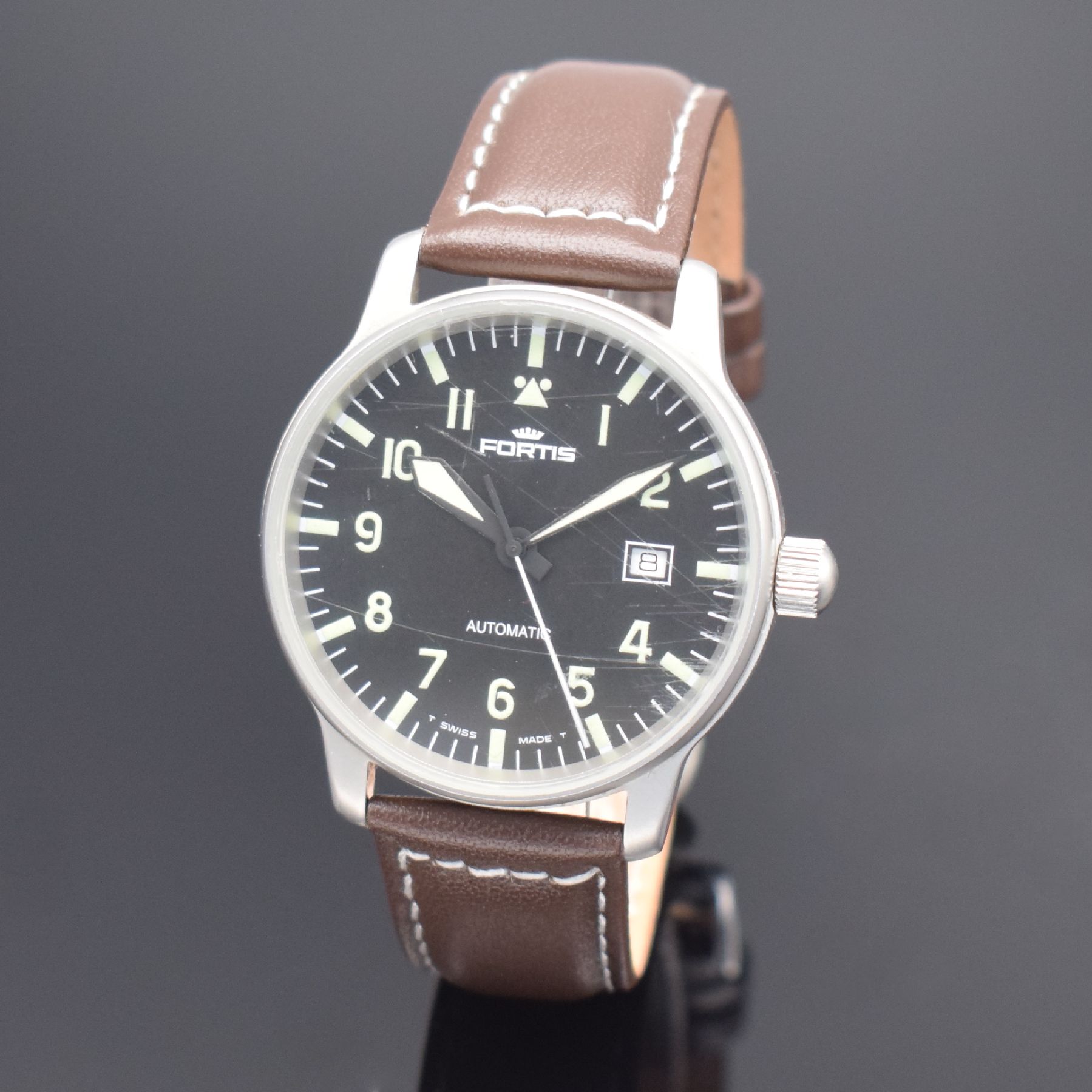 FORTIS Herrenarmbanduhr in Stahl, Schweiz um 1995, Automatik, Ref. 595.10.46, matt. Geh., Boden & Krone verschr., schwarzes Zifferbl. m. Leuchtind. & ...
