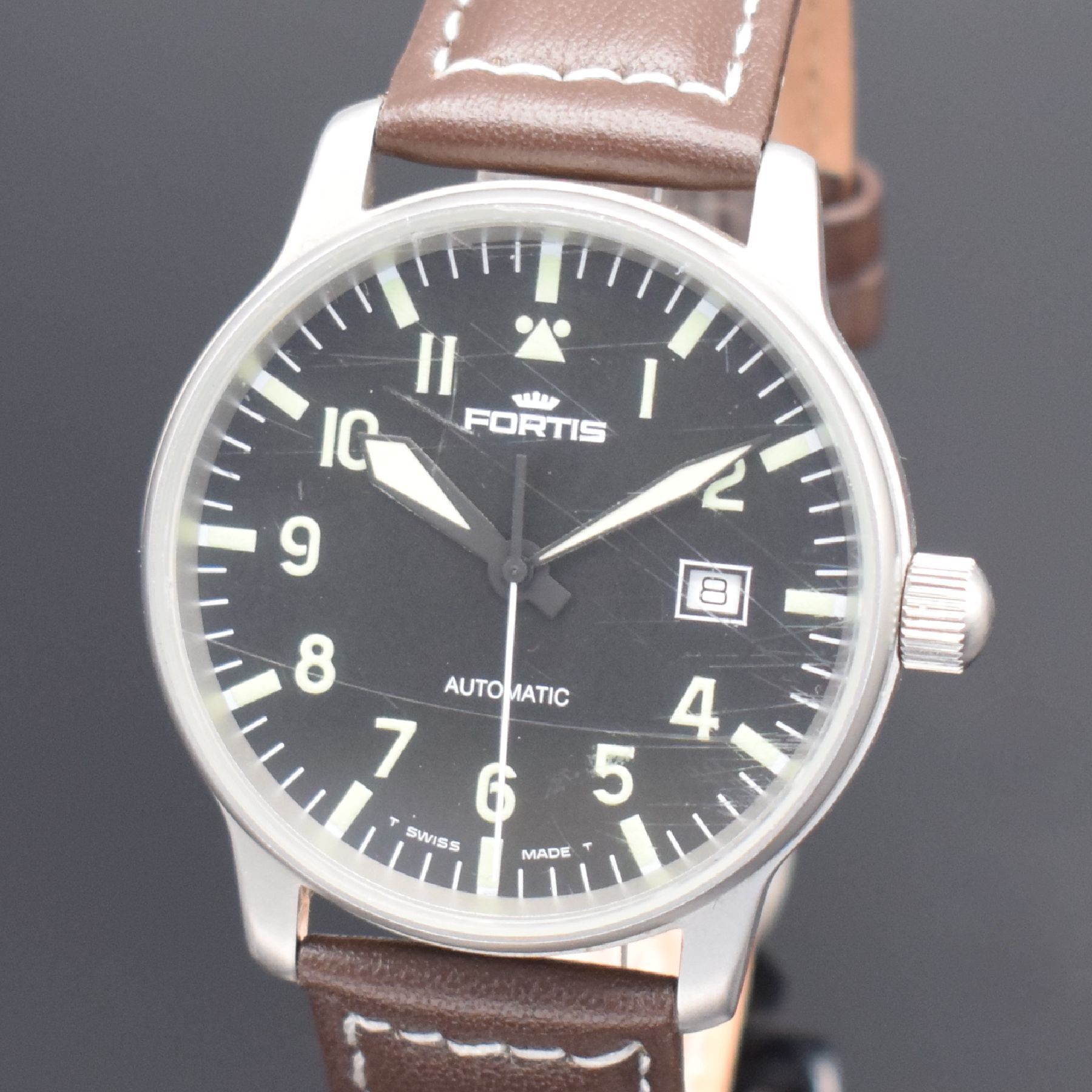 Detail a: FORTIS Herrenarmbanduhr in Stahl, Schweiz um 1995, Automatik, Ref. 595.10.46, matt. Geh., Boden & Krone verschr., schwarzes Zifferbl. m. Leuchtind. & ...