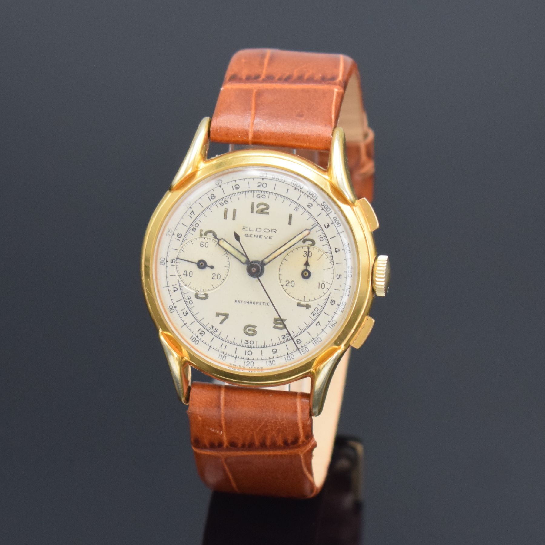 ELDOR Geneve schöner Herrenchronograph, Schweiz um 1950, Handaufzug, verg. Geh., Boden aufgedr., silb. Zifferbl. altersb. pat./fl., arab. Zahlen, ...