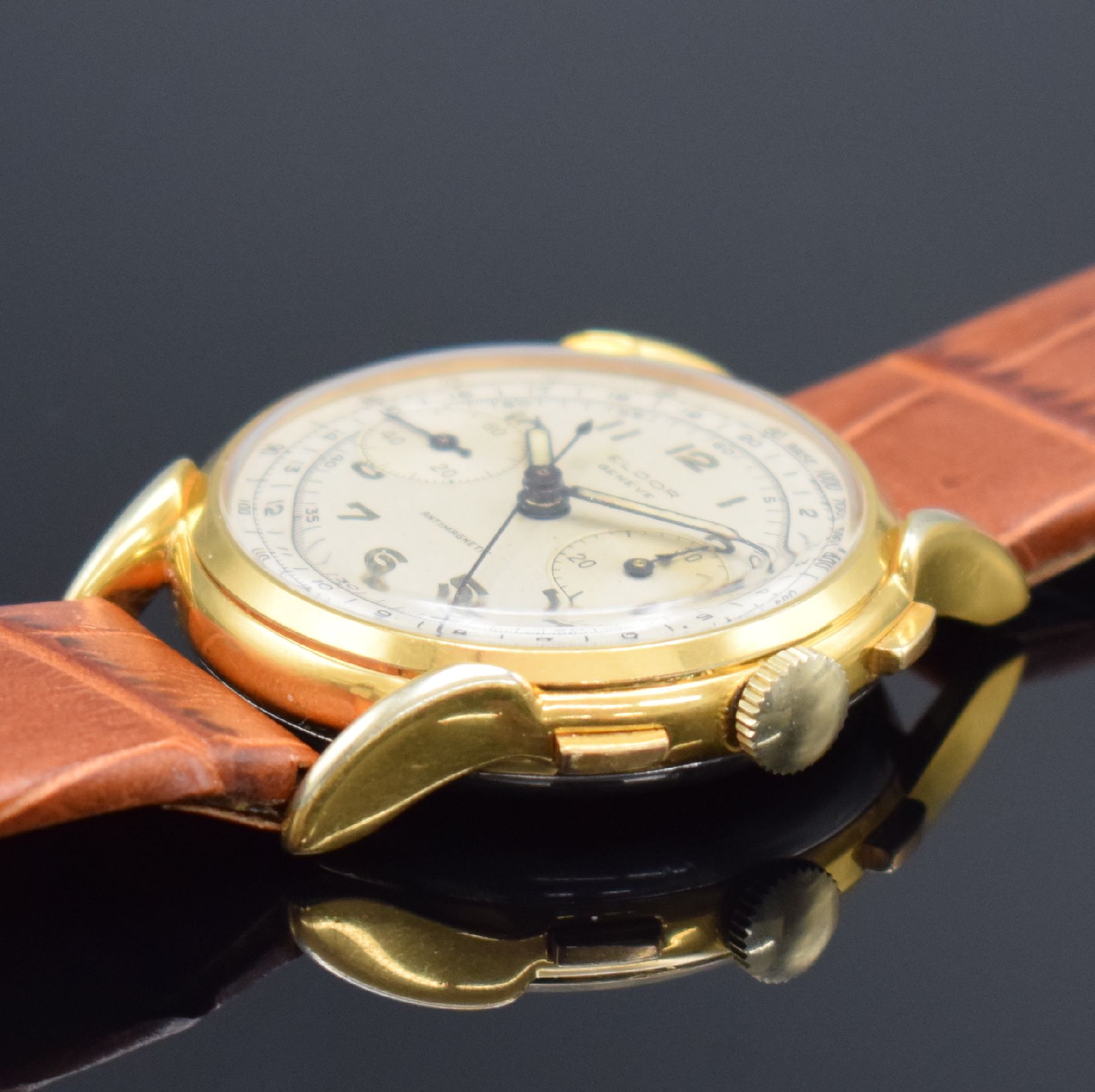 Detail b: ELDOR Geneve schöner Herrenchronograph, Schweiz um 1950, Handaufzug, verg. Geh., Boden aufgedr., silb. Zifferbl. altersb. pat./fl., arab. Zahlen, ...
