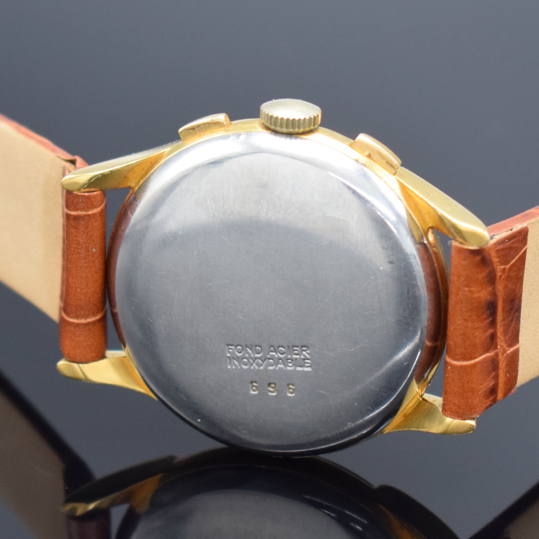 Detail c: ELDOR Geneve schöner Herrenchronograph, Schweiz um 1950, Handaufzug, verg. Geh., Boden aufgedr., silb. Zifferbl. altersb. pat./fl., arab. Zahlen, ...