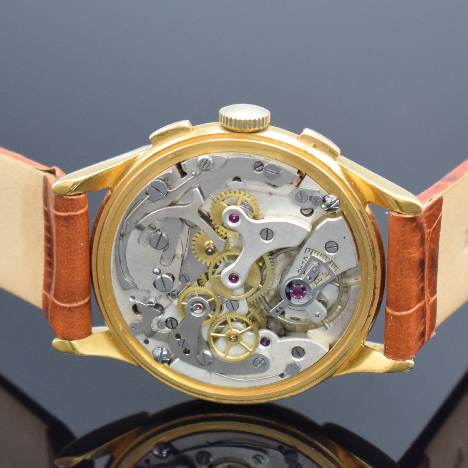 Detail d: ELDOR Geneve schöner Herrenchronograph, Schweiz um 1950, Handaufzug, verg. Geh., Boden aufgedr., silb. Zifferbl. altersb. pat./fl., arab. Zahlen, ...