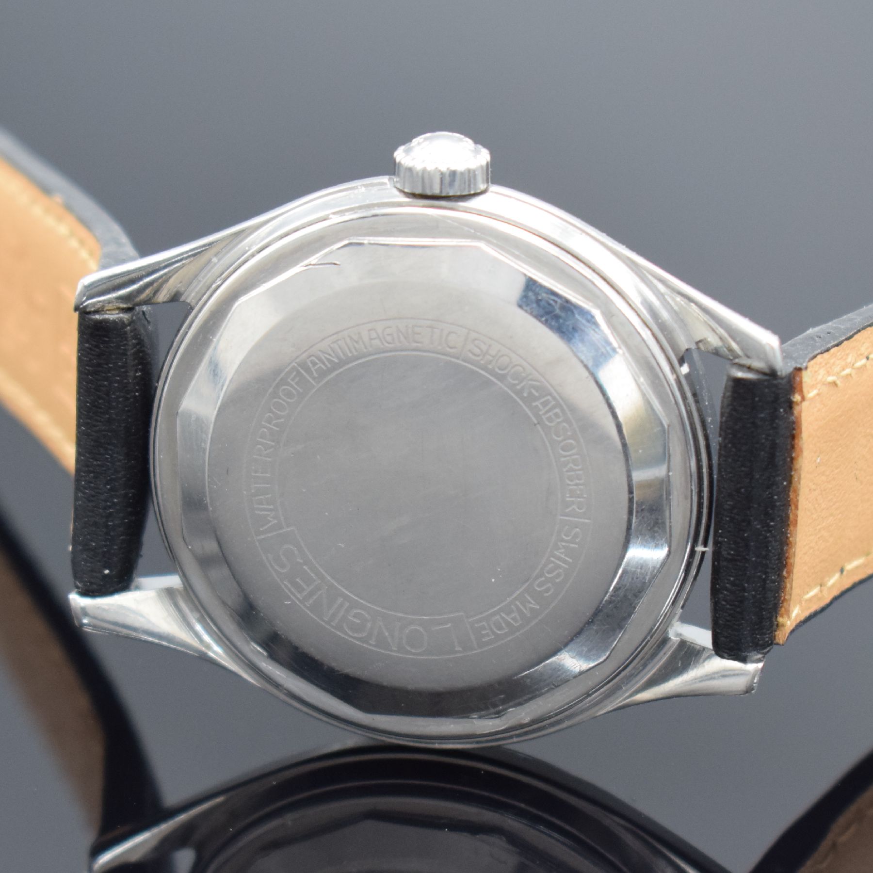 Detail c: LONGINES Herrenarmbanduhr in Stahl, Schweiz um 1955, Automatik, Boden verschr., orig. Krone, orig. silb. Duoton-Zifferbl. altersb. pat./fl., gold. ...
