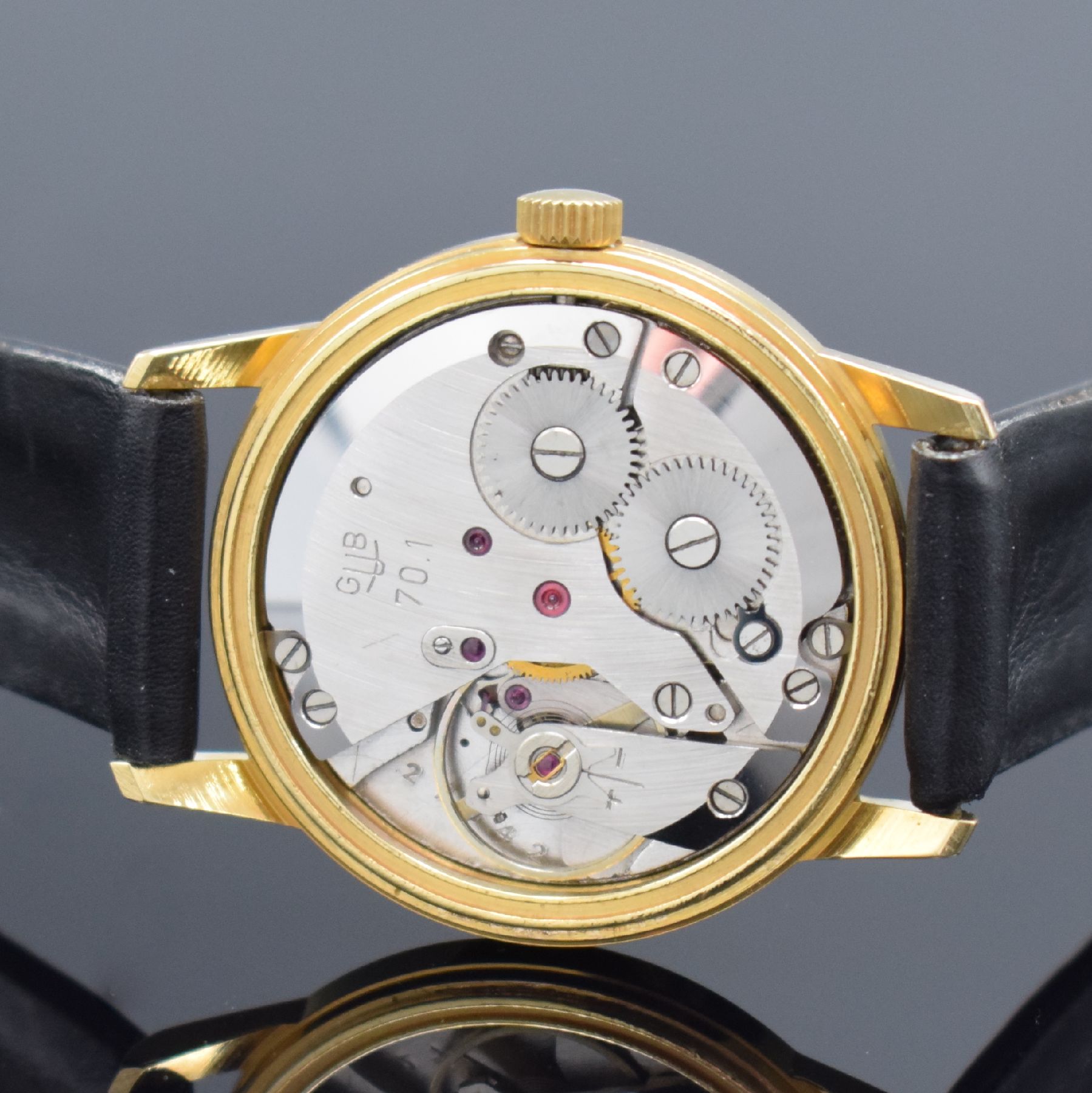 Detail c: GLASHÜTTE nahezu neuwertige Armbanduhr, Deutschland um 1960, Handaufzug, verg. Geh., Stahlboden aufgedr., orig. Lederband m. orig. Dornschl., silb. ...