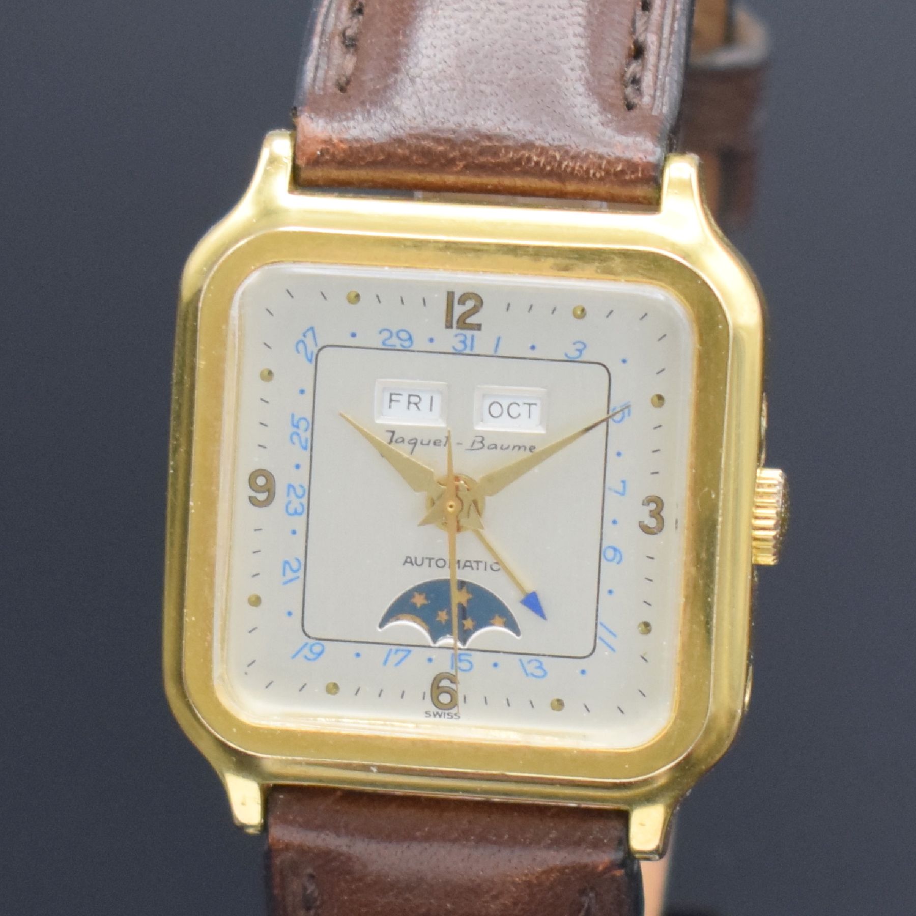 Detail a: JAQUET-BAUME Herrenarmbanduhr mit Vollkalender, Schweiz um 1970, Automatik, Boden aufgedr., Korrekturdr. seitl. im Geh. eingel., silb. Zifferbl. m. ...
