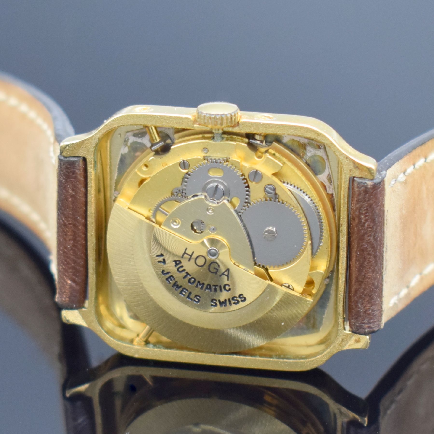 Detail e: JAQUET-BAUME Herrenarmbanduhr mit Vollkalender, Schweiz um 1970, Automatik, Boden aufgedr., Korrekturdr. seitl. im Geh. eingel., silb. Zifferbl. m. ...