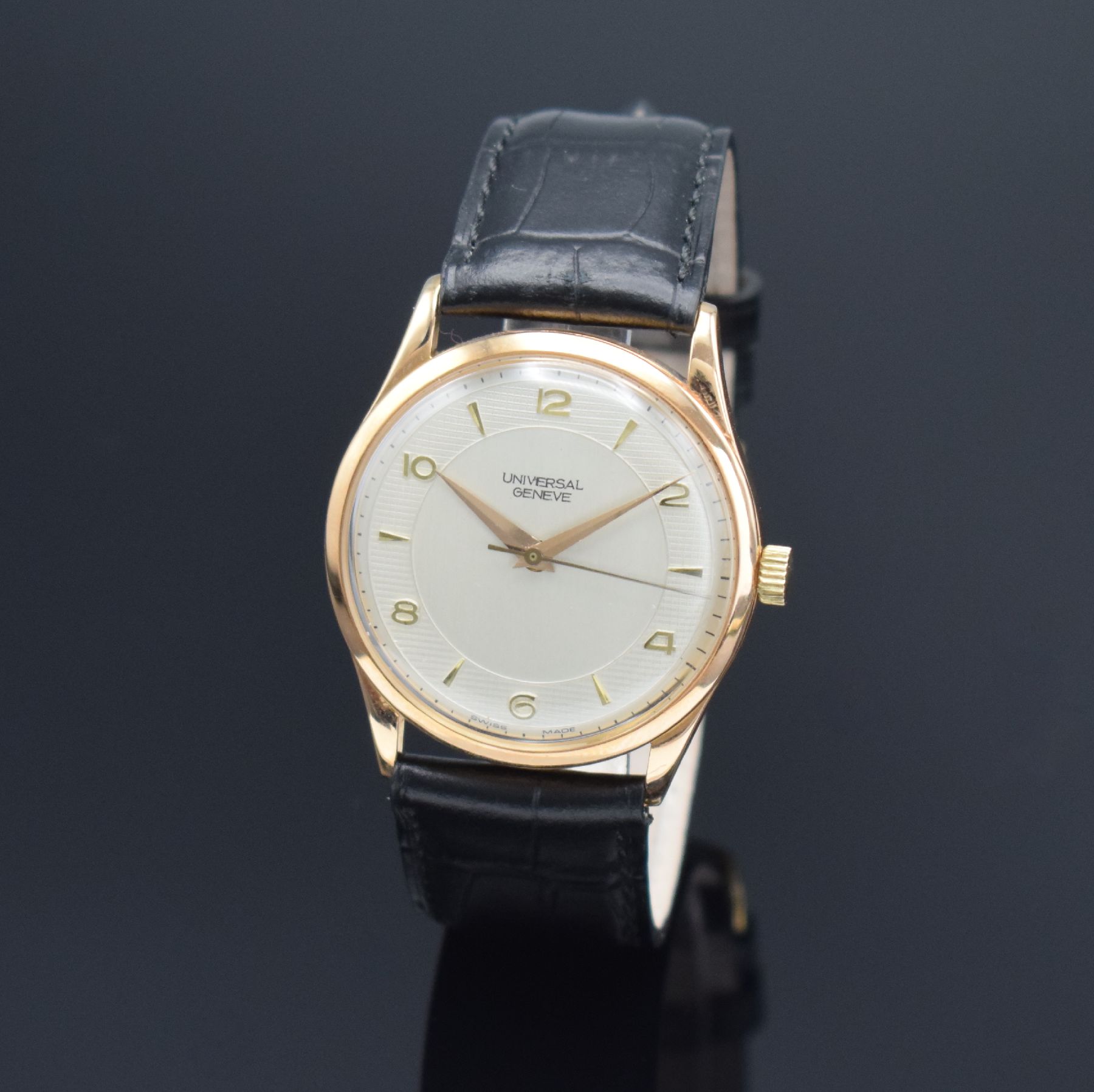UNIVERSAL GENEVE Herrenarmbanduhr Referenz 10216 mit Hammerautomatik in RG 750/000, Schweiz um 1955, 3-teil. Geh., Boden & Glasrand aufgedr., silb. ...