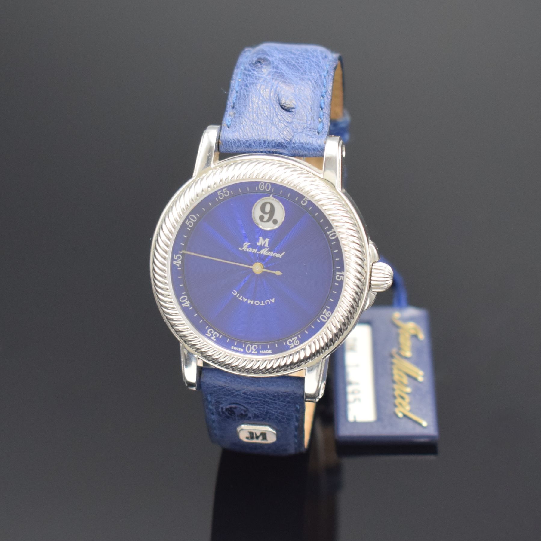 JEAN MARCEL Herrenarmbanduhr mit wandernder springender Stunde, Schweiz um 1995, Automatik, beids. vergl. Stahlgeh., Boden & Krone verschr., ...