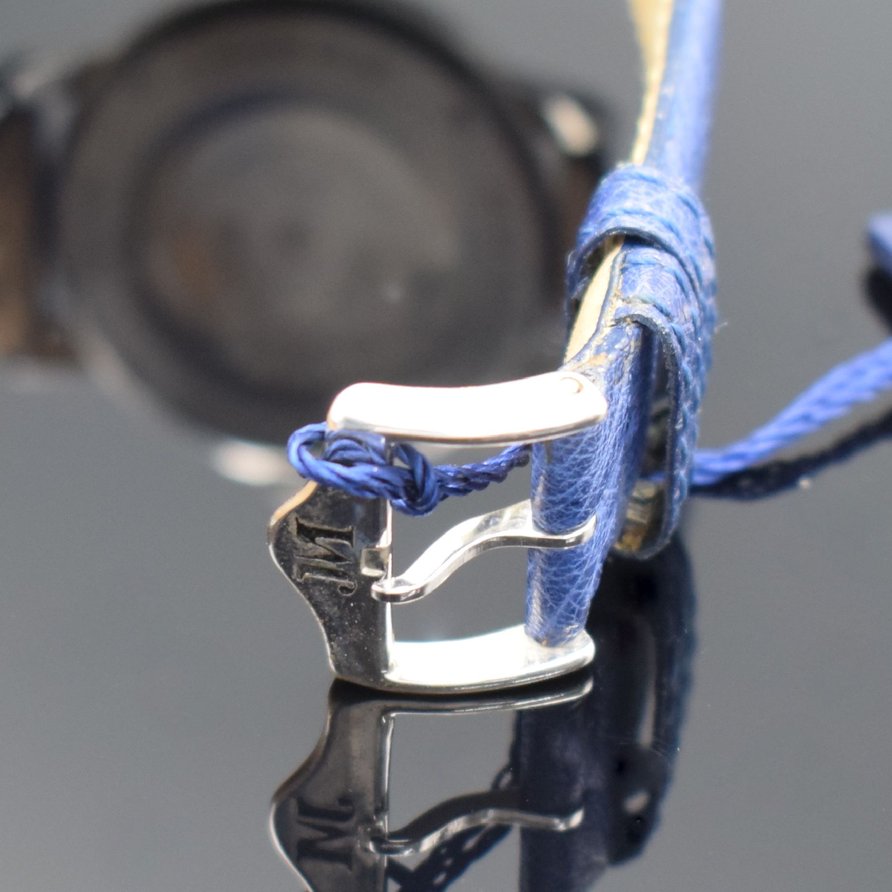 Detail b: JEAN MARCEL Herrenarmbanduhr mit wandernder springender Stunde, Schweiz um 1995, Automatik, beids. vergl. Stahlgeh., Boden & Krone verschr., ...