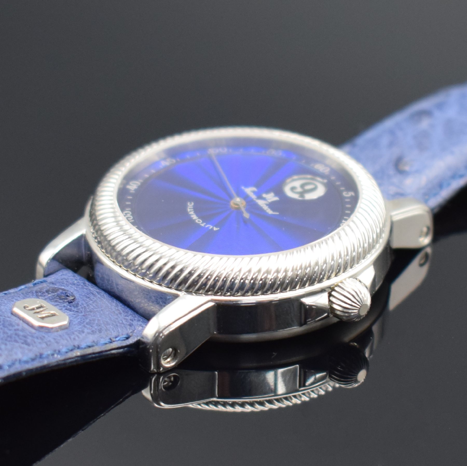 Detail c: JEAN MARCEL Herrenarmbanduhr mit wandernder springender Stunde, Schweiz um 1995, Automatik, beids. vergl. Stahlgeh., Boden & Krone verschr., ...