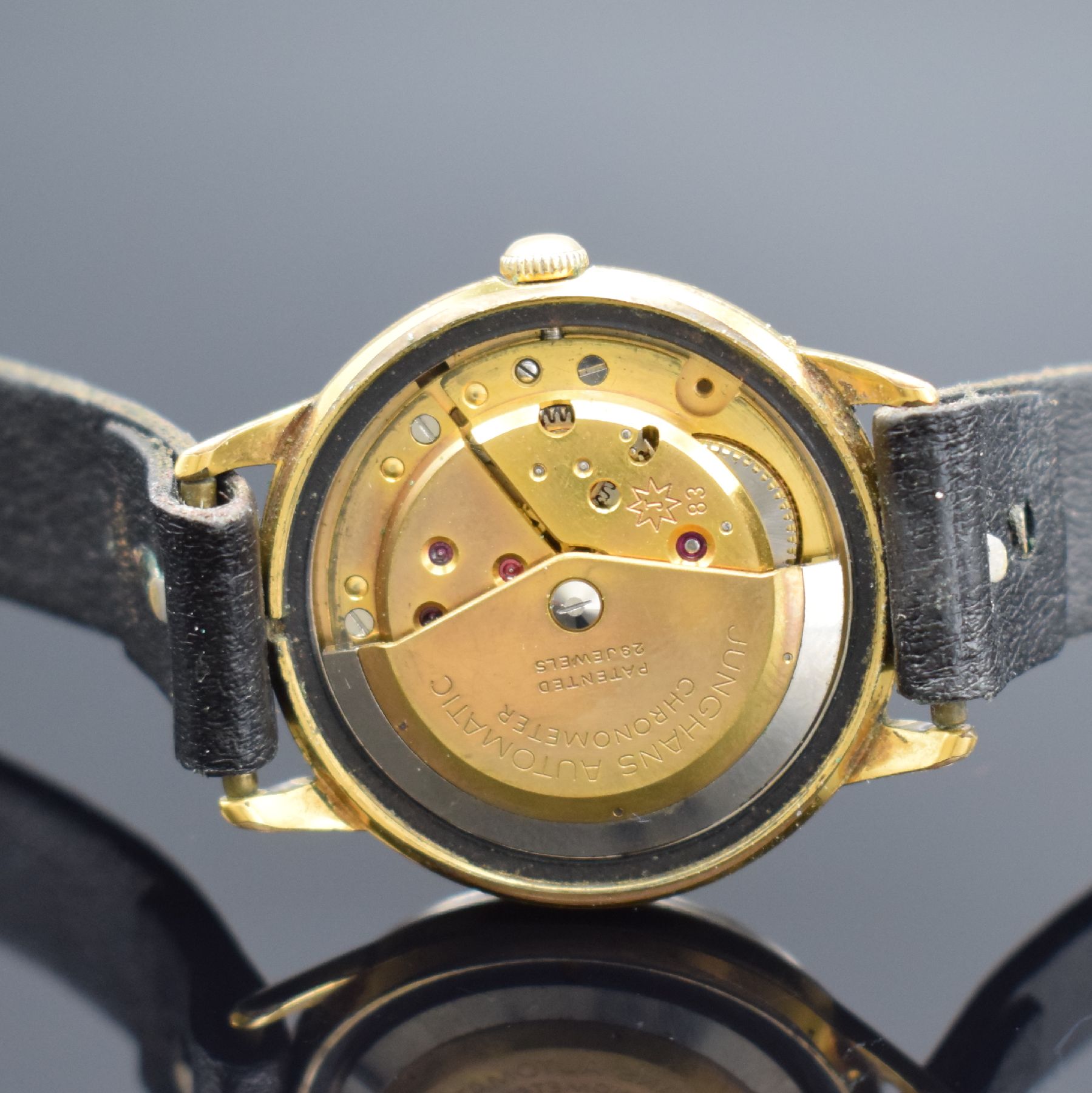 Detail d: JUNGHANS vergoldeter Herrenchronometer, Deutschland um 1960, Automatik, Boden verschr., silb. Zifferbl. altersb. pat./fl., gold. Ind. & Zeiger (teils ...