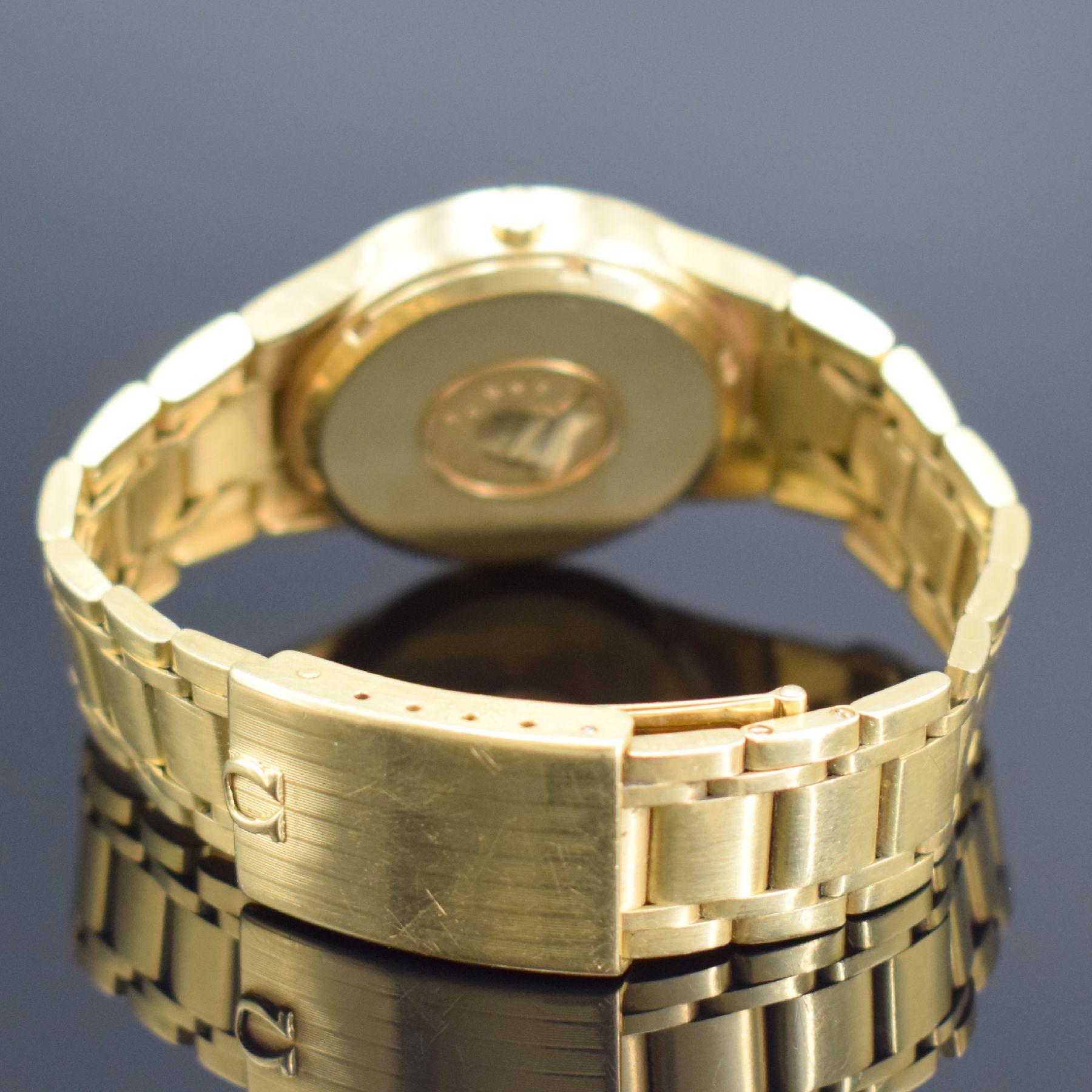 Detail c: OMEGA Constellation Electronic f 300 HZ Chronometer in GG 750/000, Schweiz um 1970, Stimmgabelschwinger, Ref. 198.7264, integriertes orig. Goldband ...