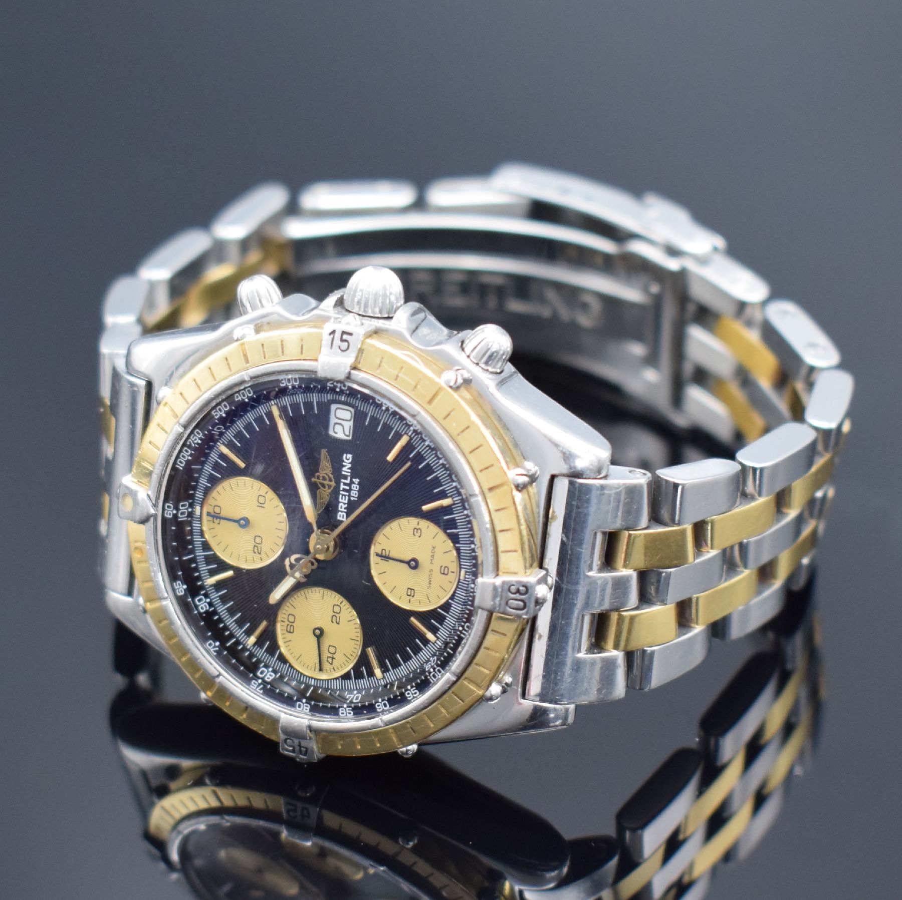 Detail b: BREITLING Herrenarmbanduhr Modellserie Chronomat Referenz D13050, Automatik, Edelstahl/Gold kombiniert inkl. Pilotband, Lün. m. 60er Teilung eins. ...