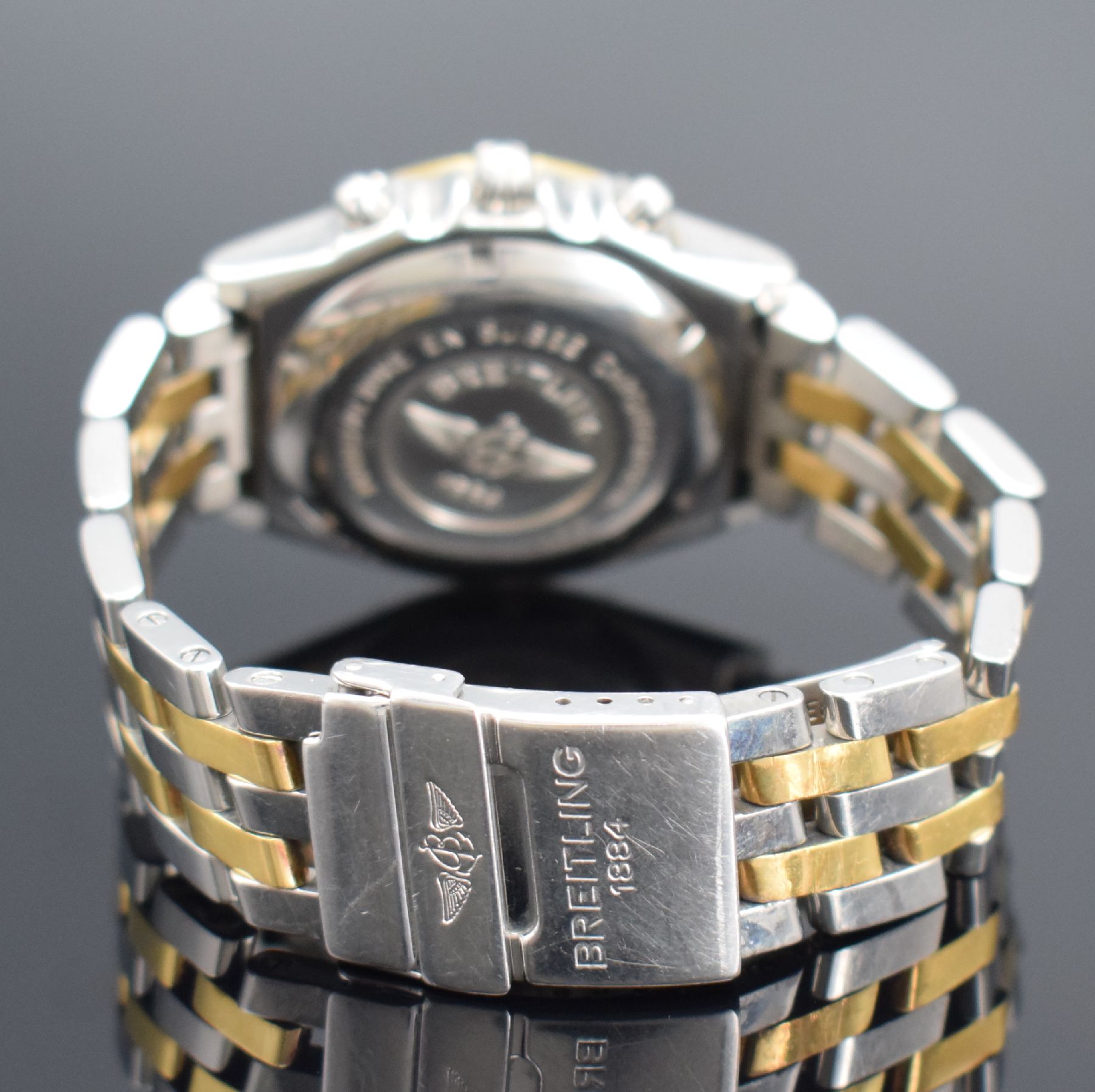 Detail c: BREITLING Herrenarmbanduhr Modellserie Chronomat Referenz D13050, Automatik, Edelstahl/Gold kombiniert inkl. Pilotband, Lün. m. 60er Teilung eins. ...