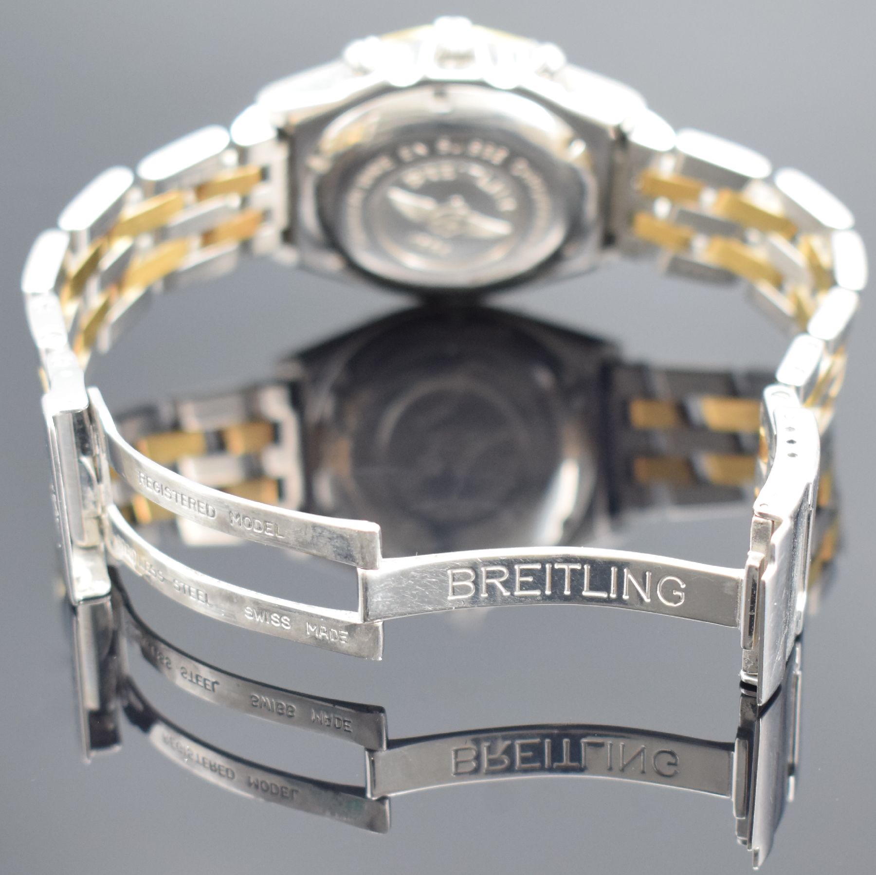 Detail d: BREITLING Herrenarmbanduhr Modellserie Chronomat Referenz D13050, Automatik, Edelstahl/Gold kombiniert inkl. Pilotband, Lün. m. 60er Teilung eins. ...