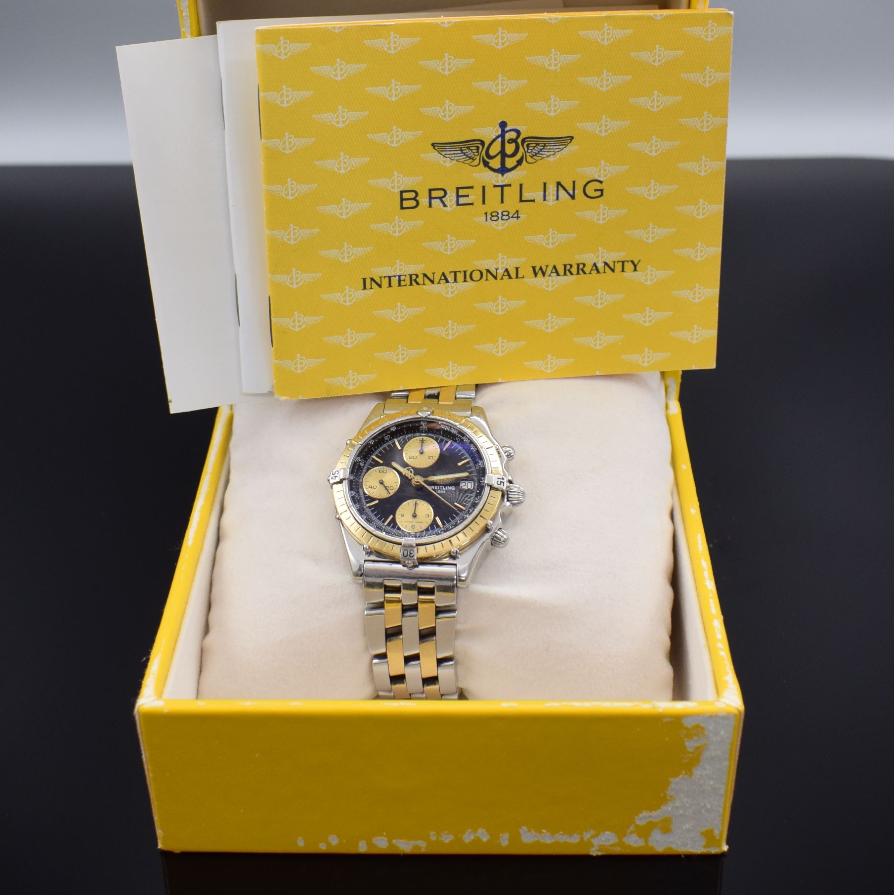Detail f: BREITLING Herrenarmbanduhr Modellserie Chronomat Referenz D13050, Automatik, Edelstahl/Gold kombiniert inkl. Pilotband, Lün. m. 60er Teilung eins. ...