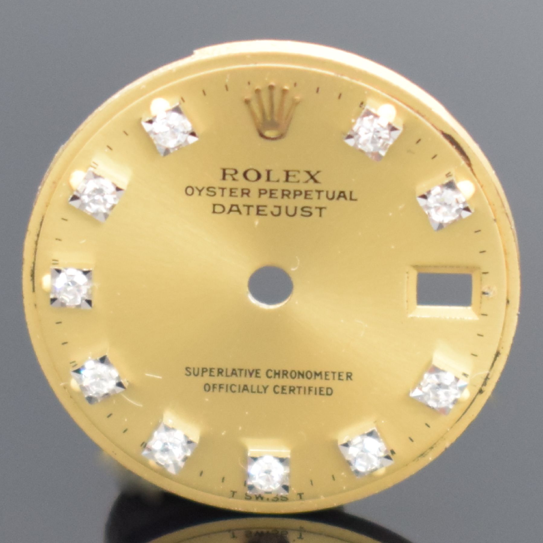 Detail a: ROLEX Datejust Zifferblatt für Damenarmbanduhr, champagnerfarben, altersbed. l. fl., 10 in GG gef. Diamantindexe, D. ca. 20 mm, nutzbar