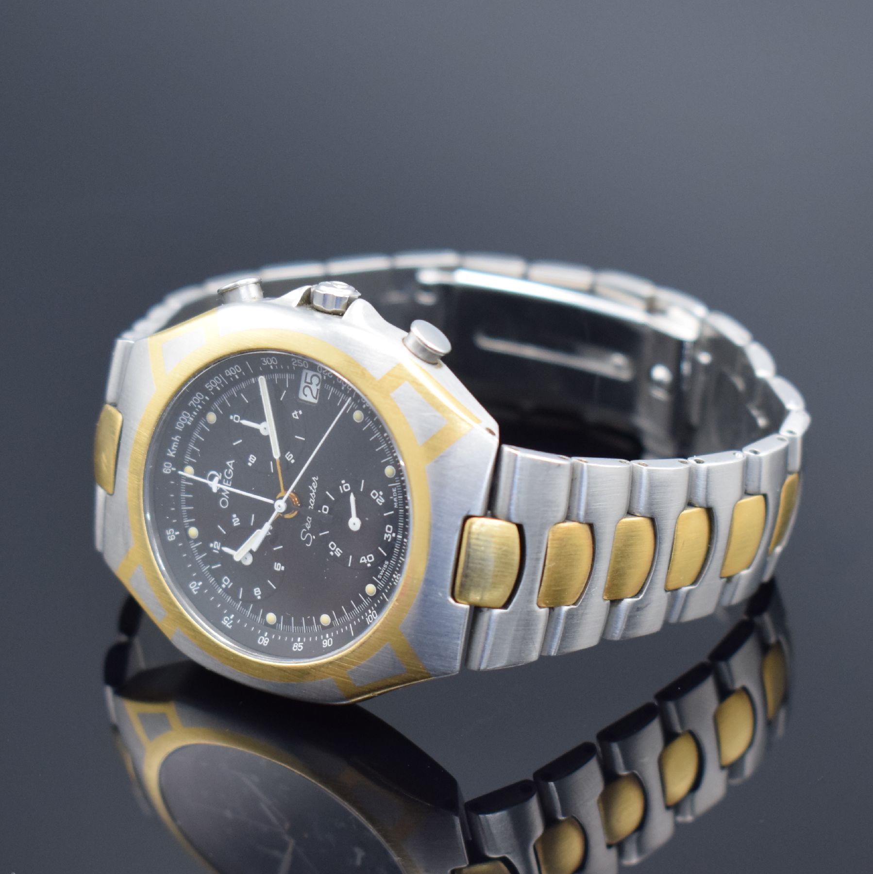Detail b: OMEGA Seamaster Polaris Armbandchronograph Referenz 386.1031, Schweiz um 1990, quarz, goldintarsiertes Edelstahlgeh. inkl. z. T. verg. ...