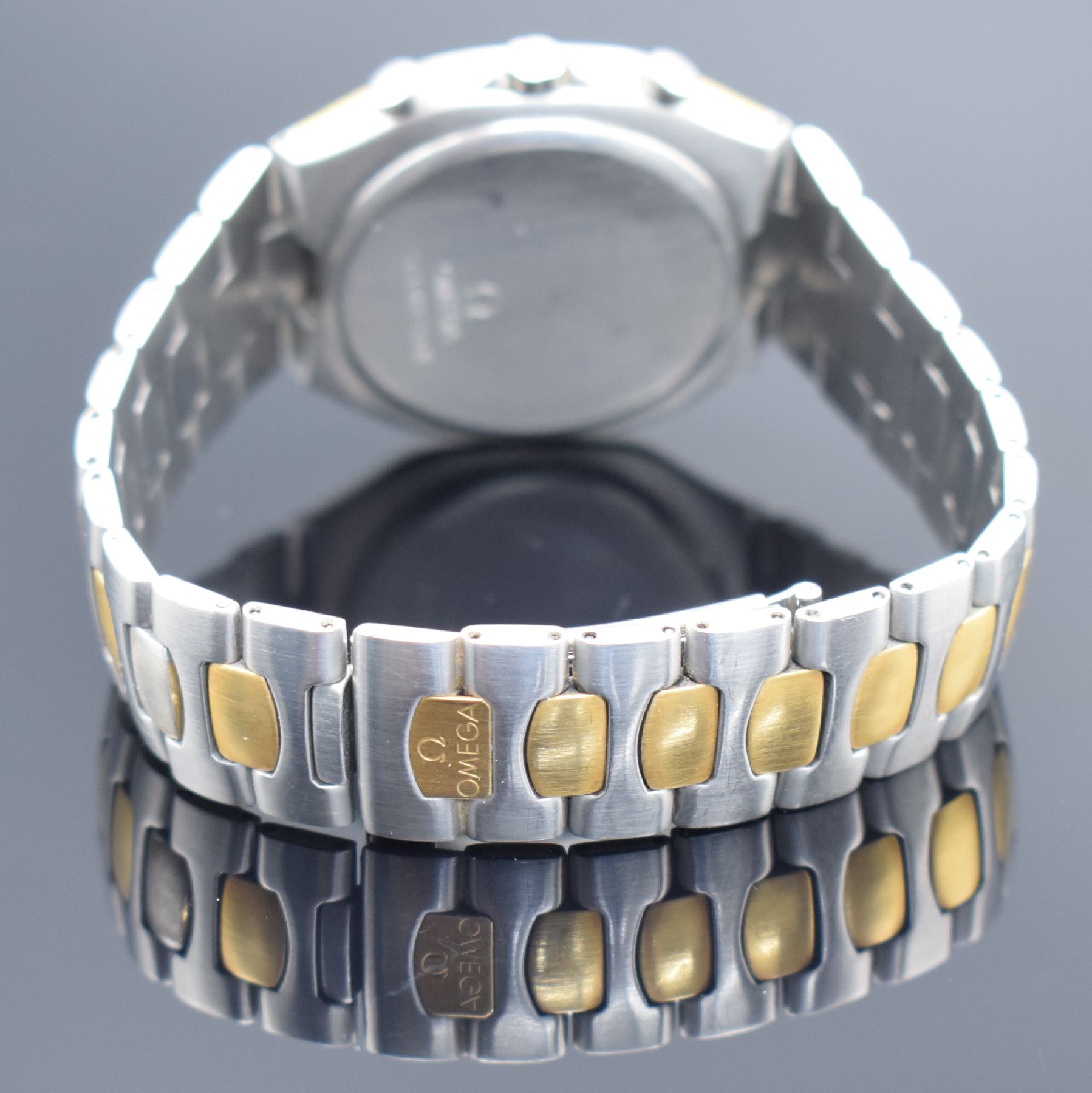 Detail c: OMEGA Seamaster Polaris Armbandchronograph Referenz 386.1031, Schweiz um 1990, quarz, goldintarsiertes Edelstahlgeh. inkl. z. T. verg. ...