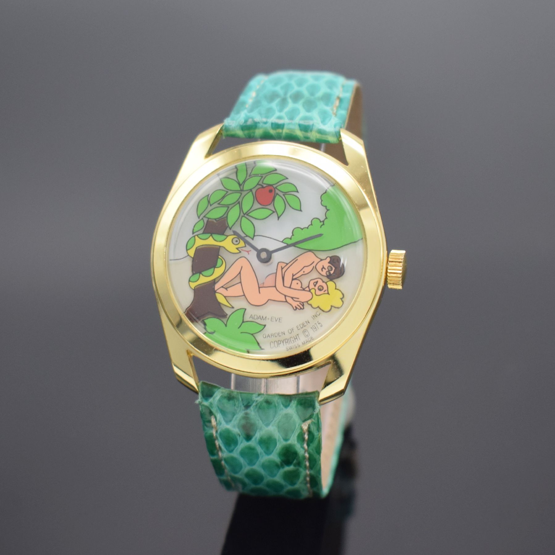 ADAM & EVE Armbanduhr mit beweglicher, erotischer Szenerie, Schweiz um 1975, Serie Garden of Eden, Handaufzug, verg. Gehäuse, Boden aufgedr., bunt ...