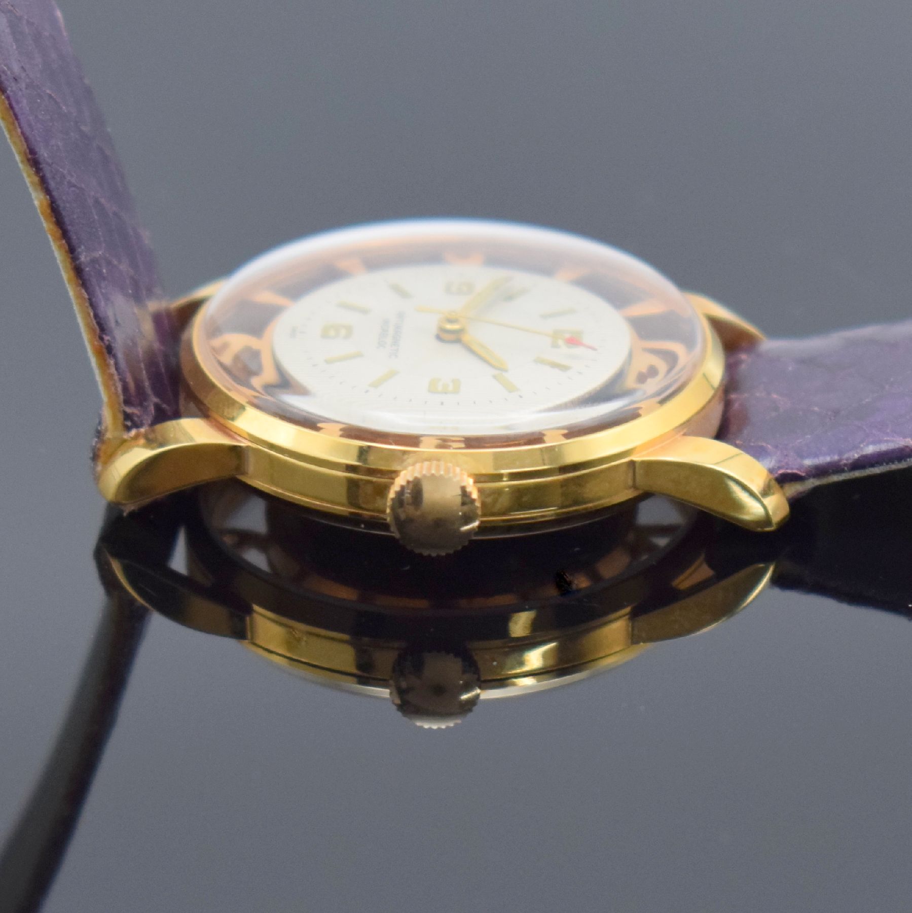 Detail d: Ausgefallene Armbanduhr sog. Cocktail Watch, Schweiz um 1960, Handaufzug, verg. durchbr. Geh., silb. Zifferbl. m. aufges. Std.-Ind., gold. Zeiger, ...
