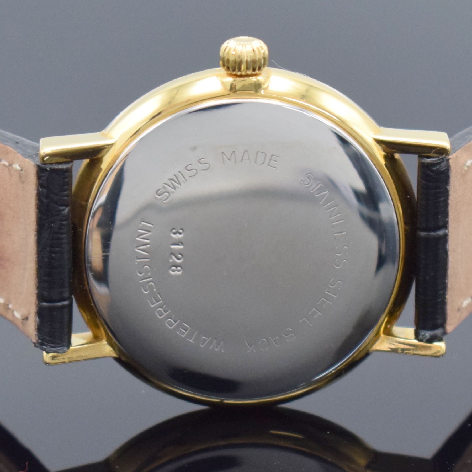 Detail e: Herrenarmbanduhr mit Kaliber Peseux 7046, Schweiz um 1990, Handaufzug, verg. Gehäuse, Stahlboden aufgedr., silb. guill. Zifferbl. mit röm. Zahlen, ...