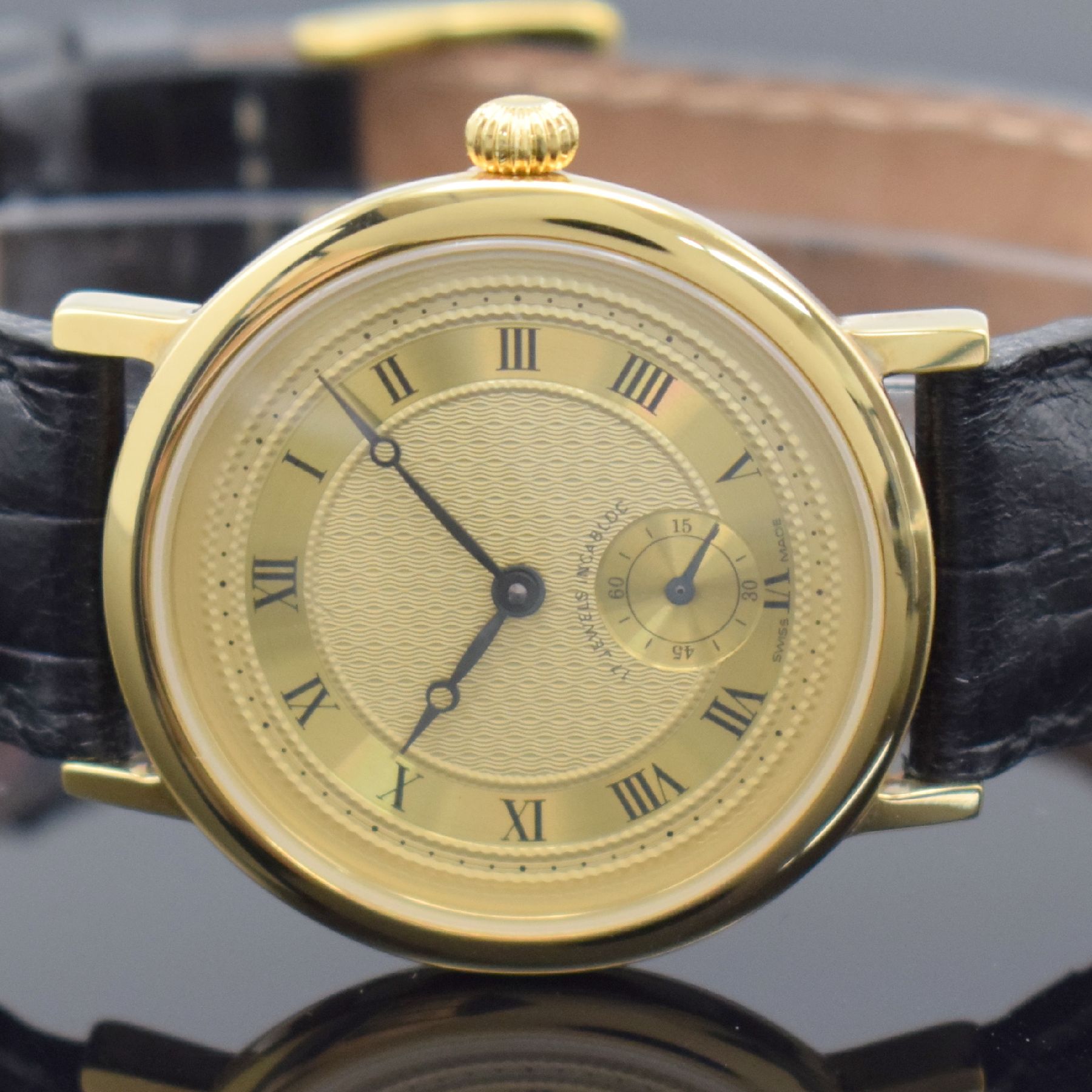 Detail c: Herrenarmbanduhr mit Kaliber Peseux 7046, Schweiz um 1990, Handaufzug, verg. Gehäuse, Stahlboden gedr., verg. guill. Zifferbl. mit röm. Zahlen, ...