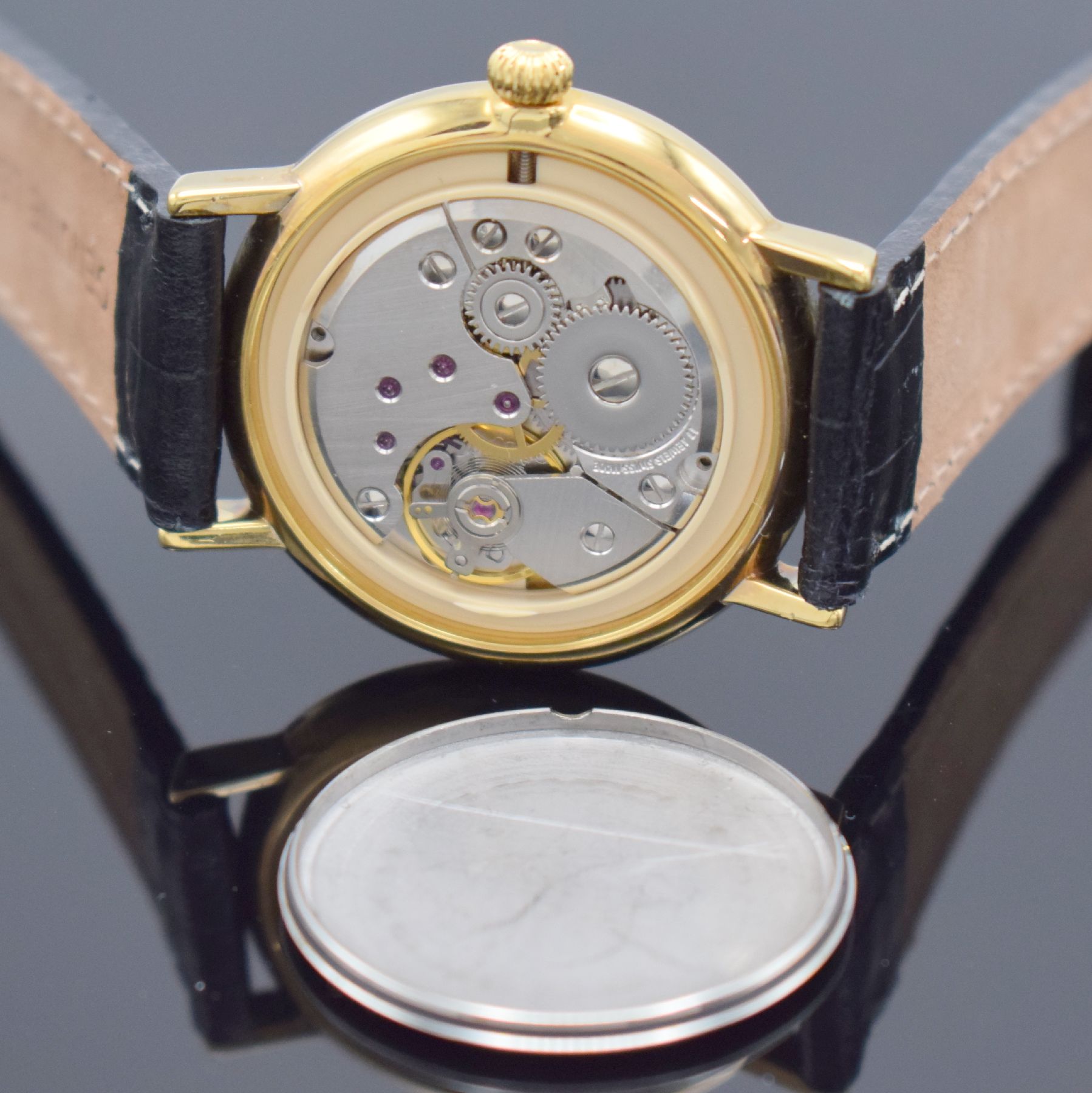Detail f: Herrenarmbanduhr mit Kaliber Peseux 7046, Schweiz um 1990, Handaufzug, verg. Gehäuse, Stahlboden gedr., verg. guill. Zifferbl. mit röm. Zahlen, ...