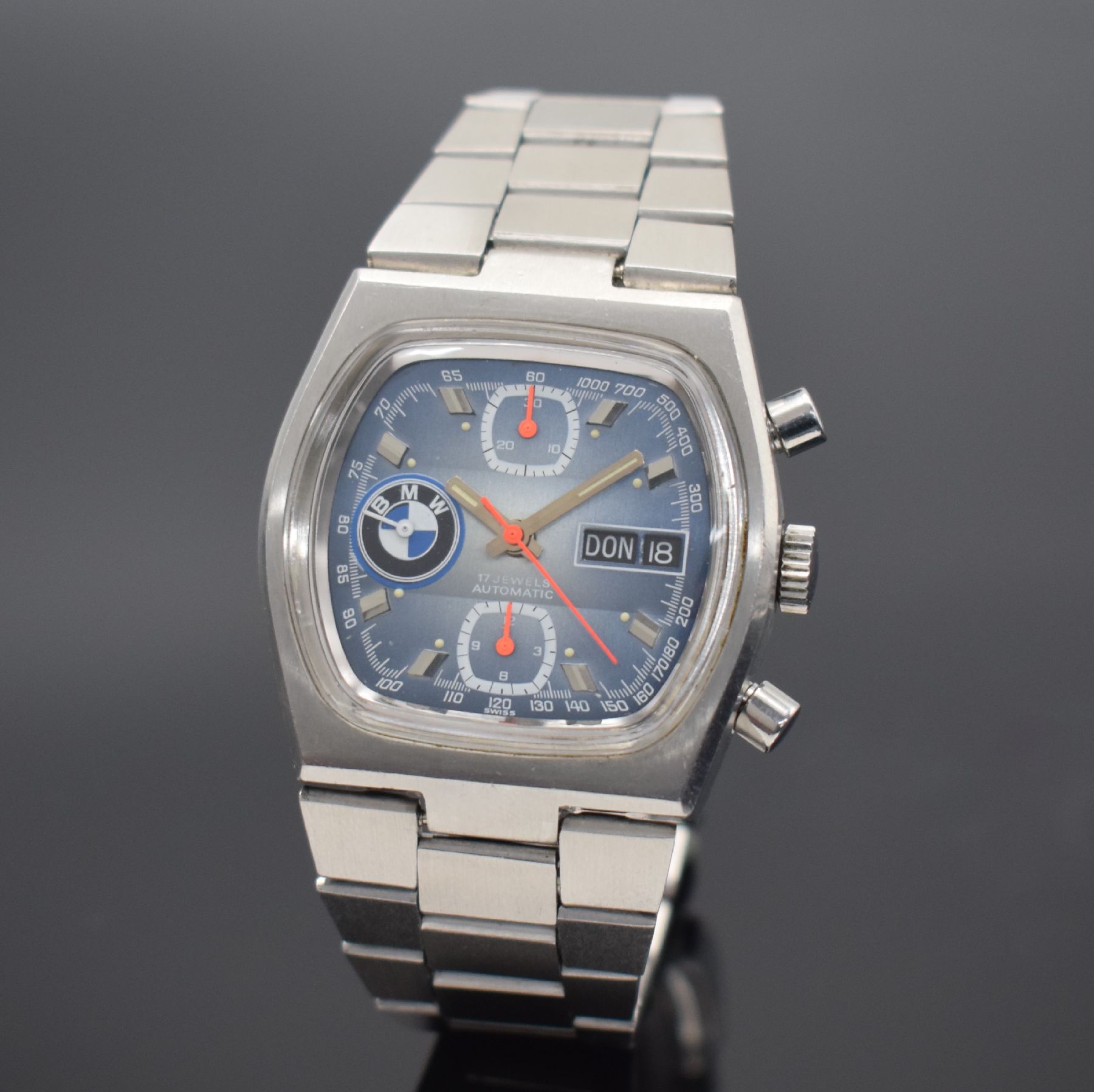 BMW Herrenarmbanduhr mit Chronograph, Schweiz um 1970, Automatik, Edelstahlgeh. inkl. neutr. Gliederband m. Faltschl., Boden verschr., hellblaues ...
