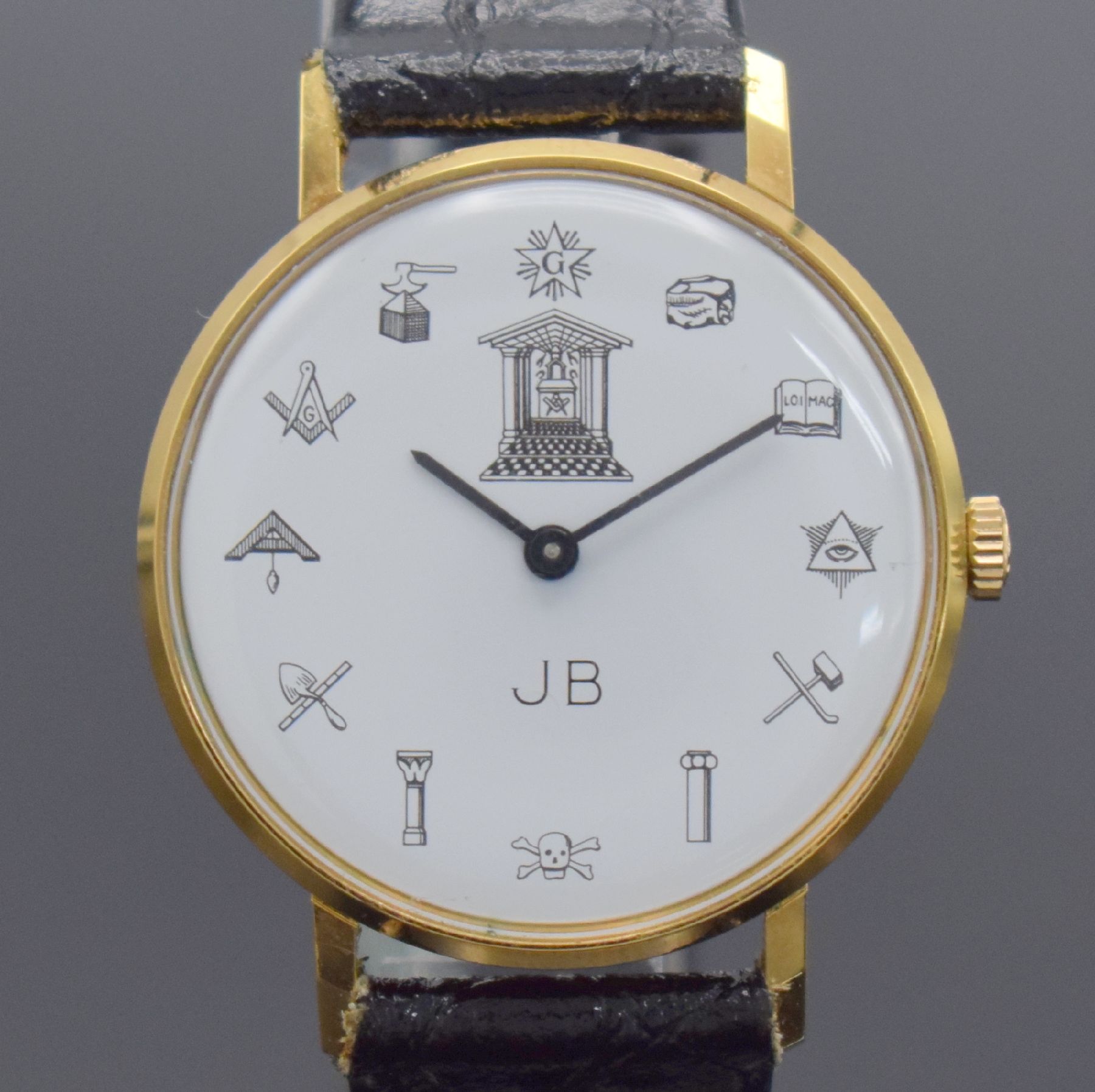 Detail a: JB Freimaurer vergoldete Armbanduhr, Schweiz um 1970, Handaufzug, Edelstahlboden aufgedr., weißes Zifferbl. m. Freimaurer Symbolen, geschw. Zeiger, ...