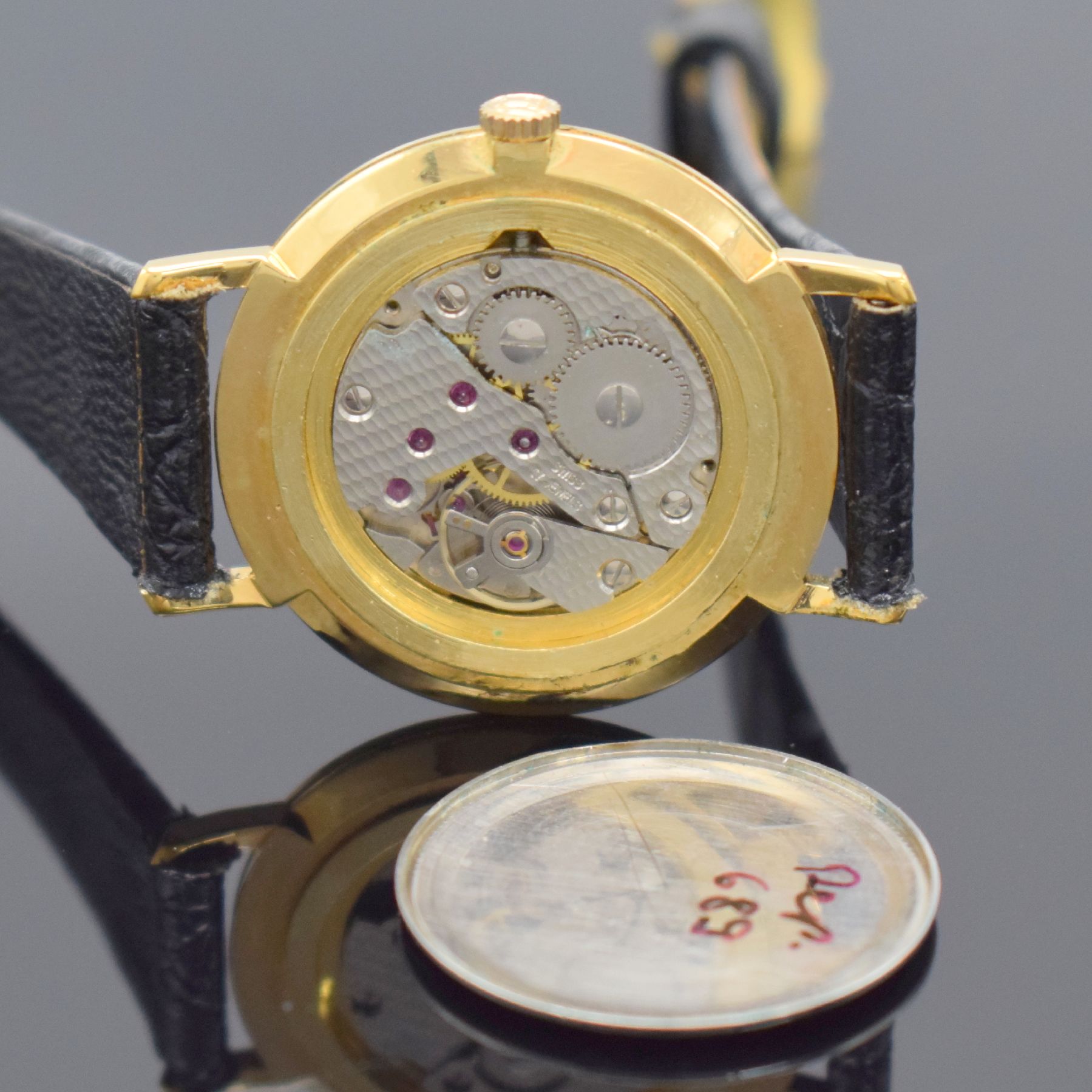 Detail g: JB Freimaurer vergoldete Armbanduhr, Schweiz um 1970, Handaufzug, Edelstahlboden aufgedr., weißes Zifferbl. m. Freimaurer Symbolen, geschw. Zeiger, ...