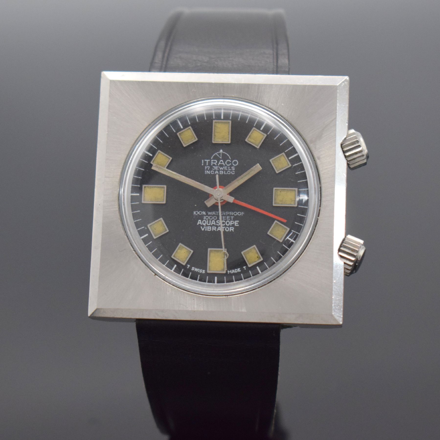 ITRACO Aquascope Vibrator Herrenarmbanduhr mit Wecker, Schweiz um 1965, Handaufzug, Edelstahlgeh., verschr. Boden, Krone f. Aufzug & Zeigerst. b. 4, ...