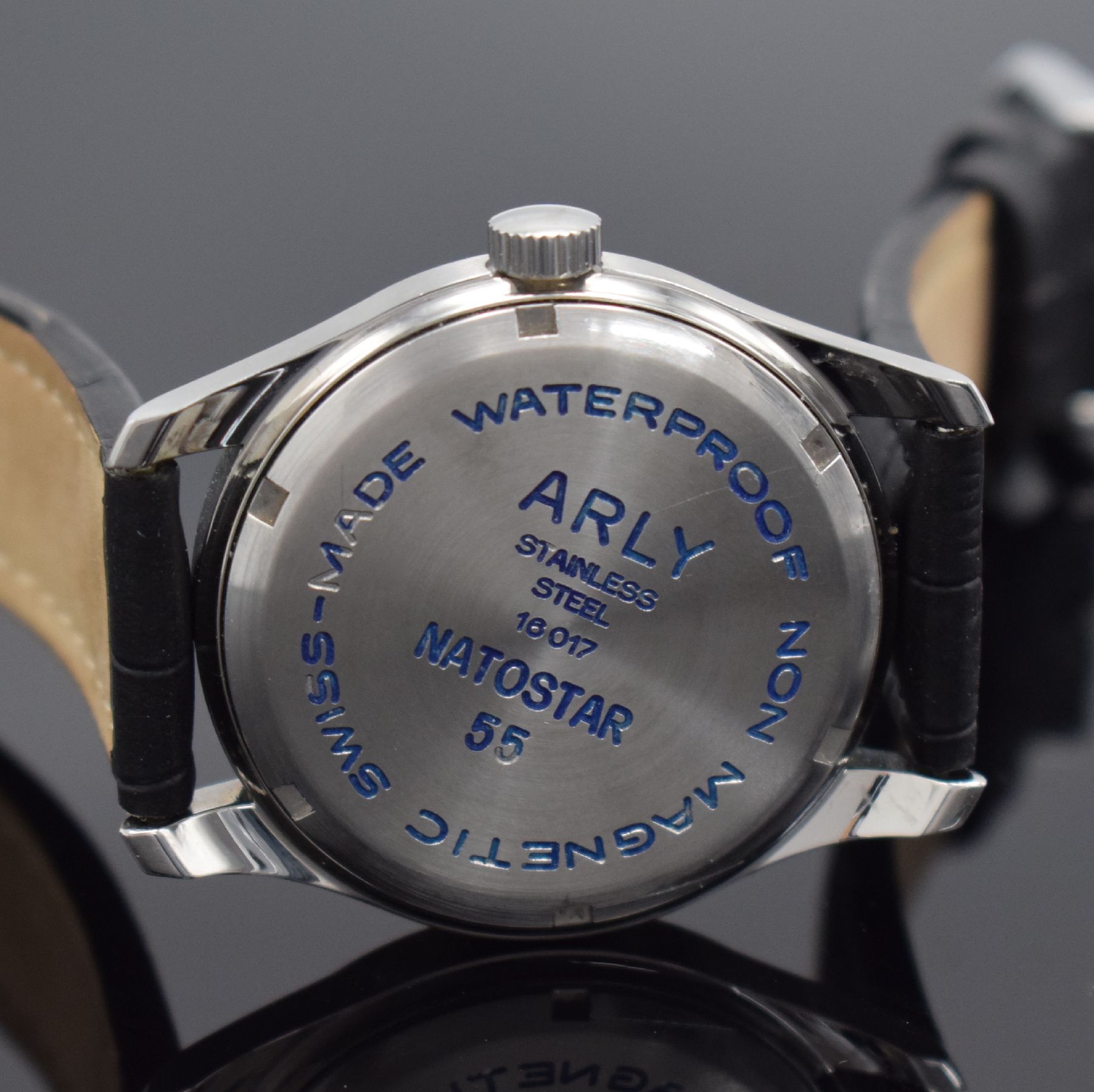 Detail f: ARLY Natostar Herrenarmbanduhr, Werk Schweiz um 1955, Handaufzug, verschr. Boden & Geh. später, schwarzes Zifferbl. m. arab. Zahlen, weiße Zeiger, ...