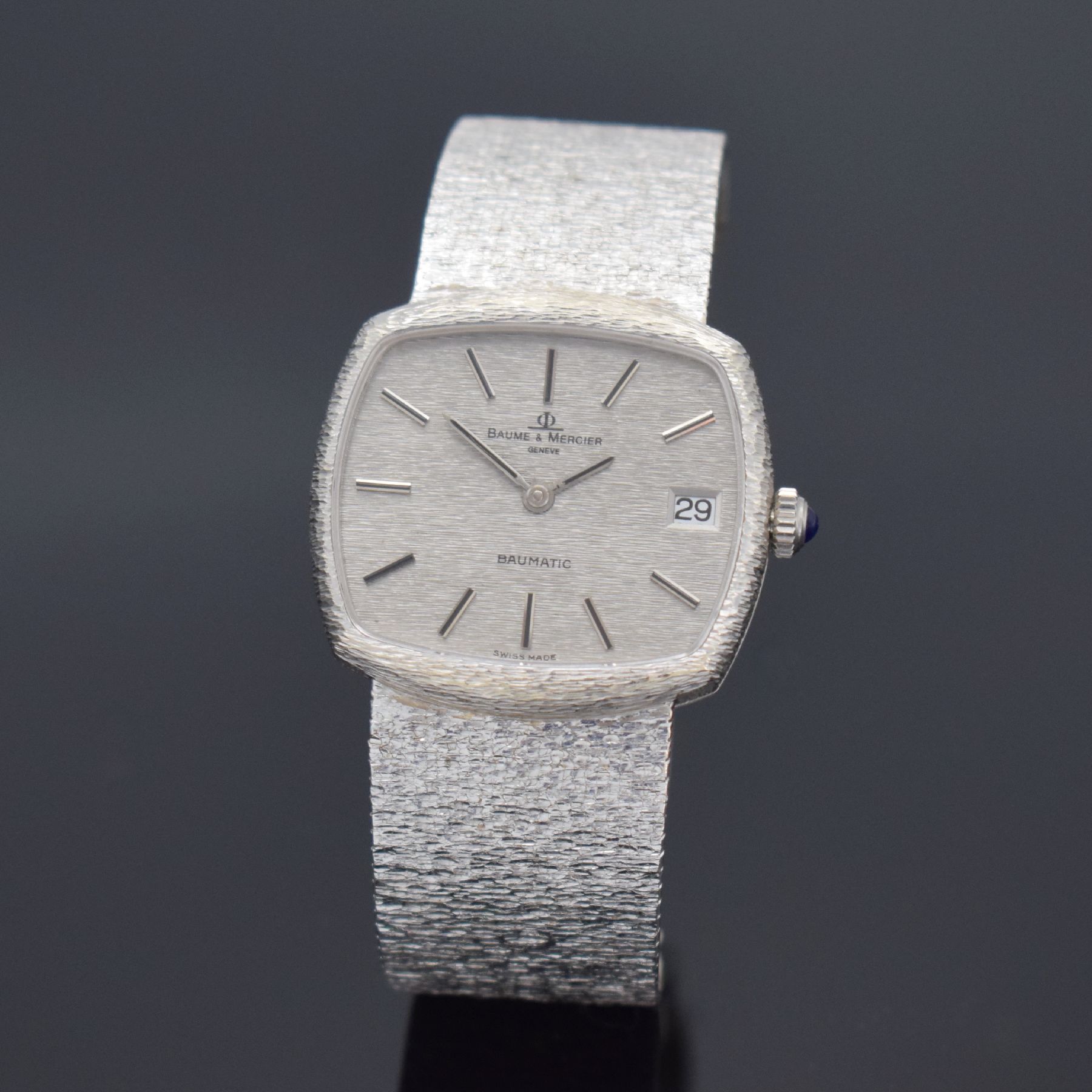 BAUME & MERCIER Baumatic Armbanduhr in WG 750/000, Schweiz um 1980, Automatik, Geh. an Goldband in WG 750/000, Boden 4-fach verschr., Schmuckkrone, ...