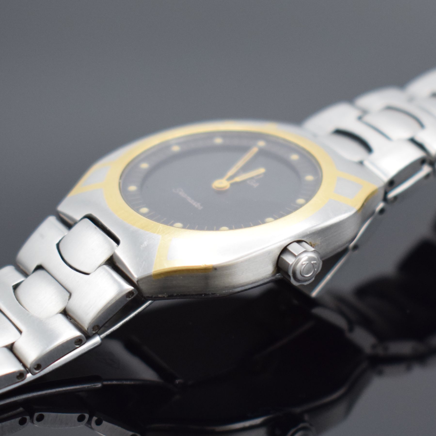 Detail e: OMEGA Seamaster Polaris Herrenarmbanduhr mit Multifunktionen, Schweiz um 1985, quarz mit digitaler & analoger Anzeige, Edelstahl teils m. Gold ...