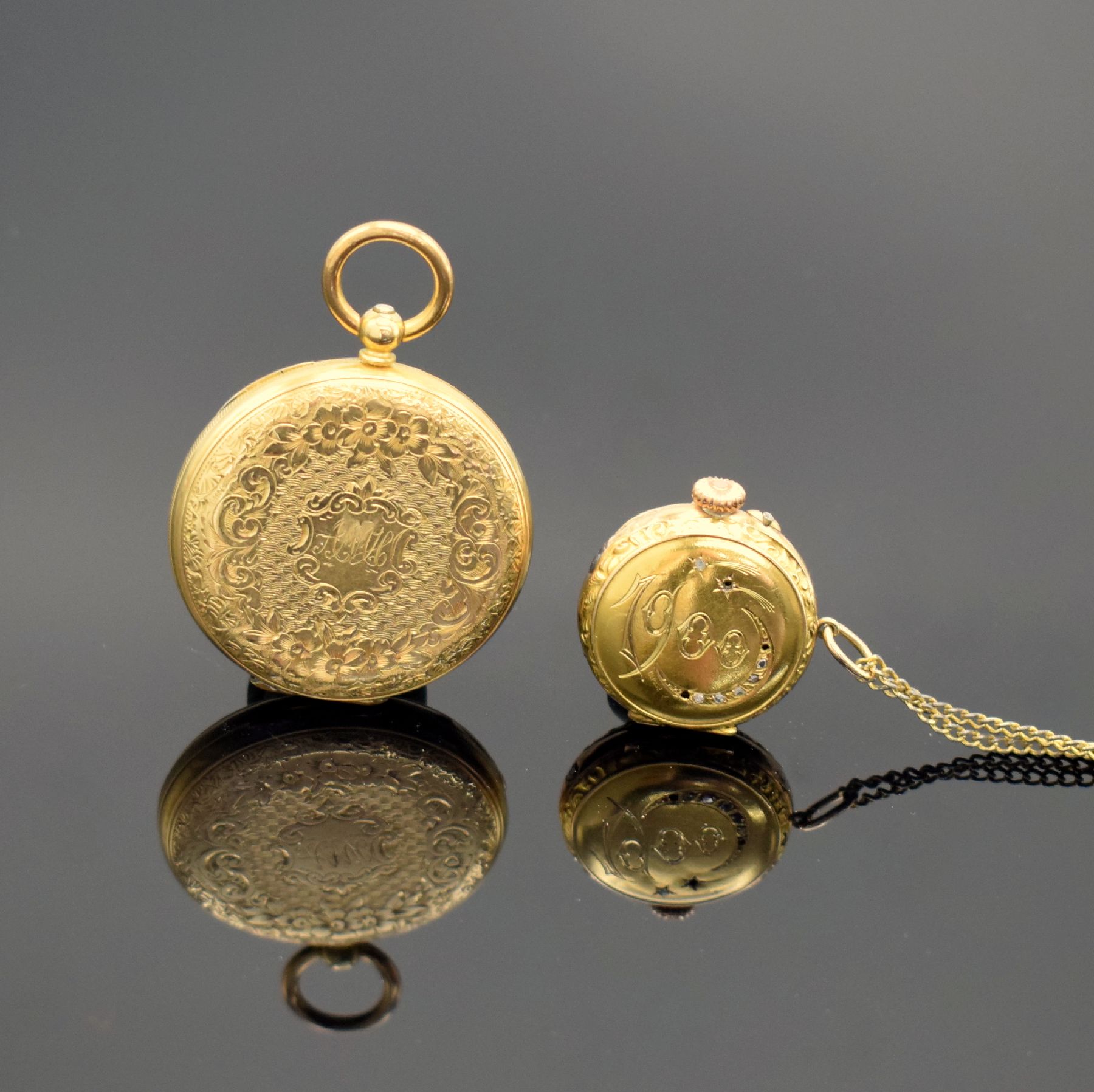 Detail b: 2 Damentaschenuhren in GG 750/000 mit Zylinderhemmungen, Schweiz um 1870/1880, 1x m. Metallcuvette & Monogramm, Email- & Metall-Zifferbl. m. röm. ...