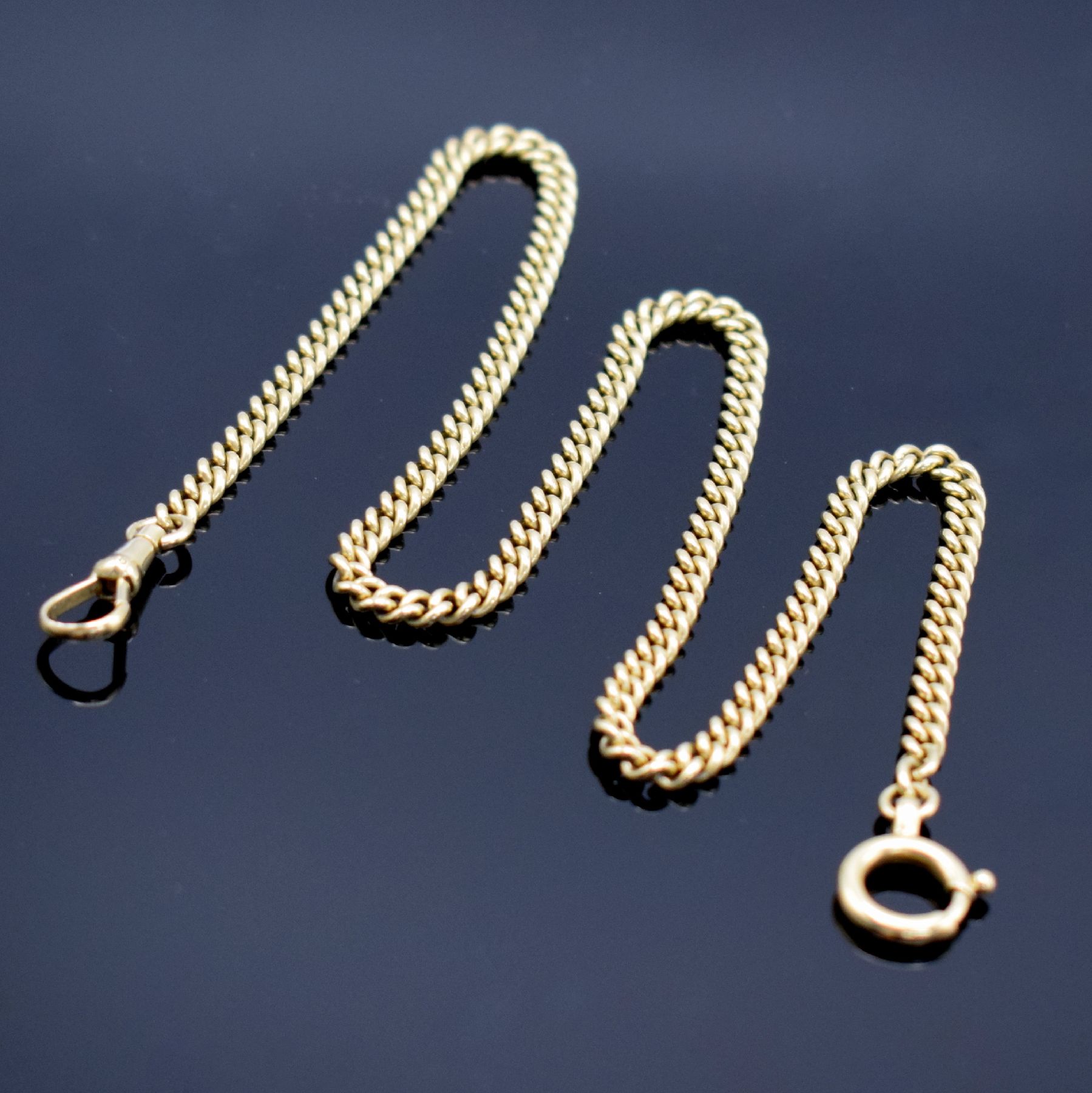 Taschenuhrkette in GG 585/000, Deutschland 20 Jhd., m. Karabiner & Federring, L. ca. 41 cm, Gew. ca. 23g