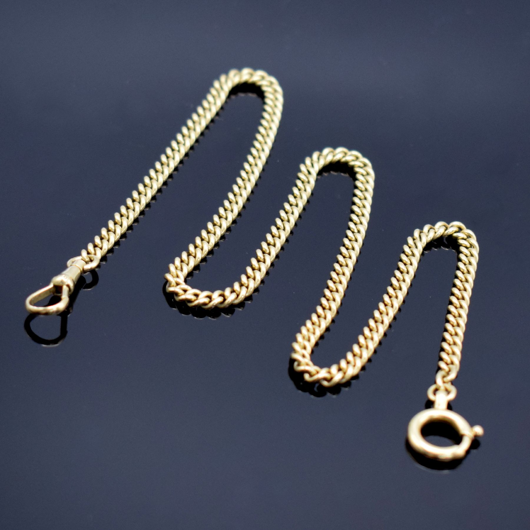 Detail a: Taschenuhrkette in GG 585/000, Deutschland 20 Jhd., m. Karabiner & Federring, L. ca. 41 cm, Gew. ca. 23g