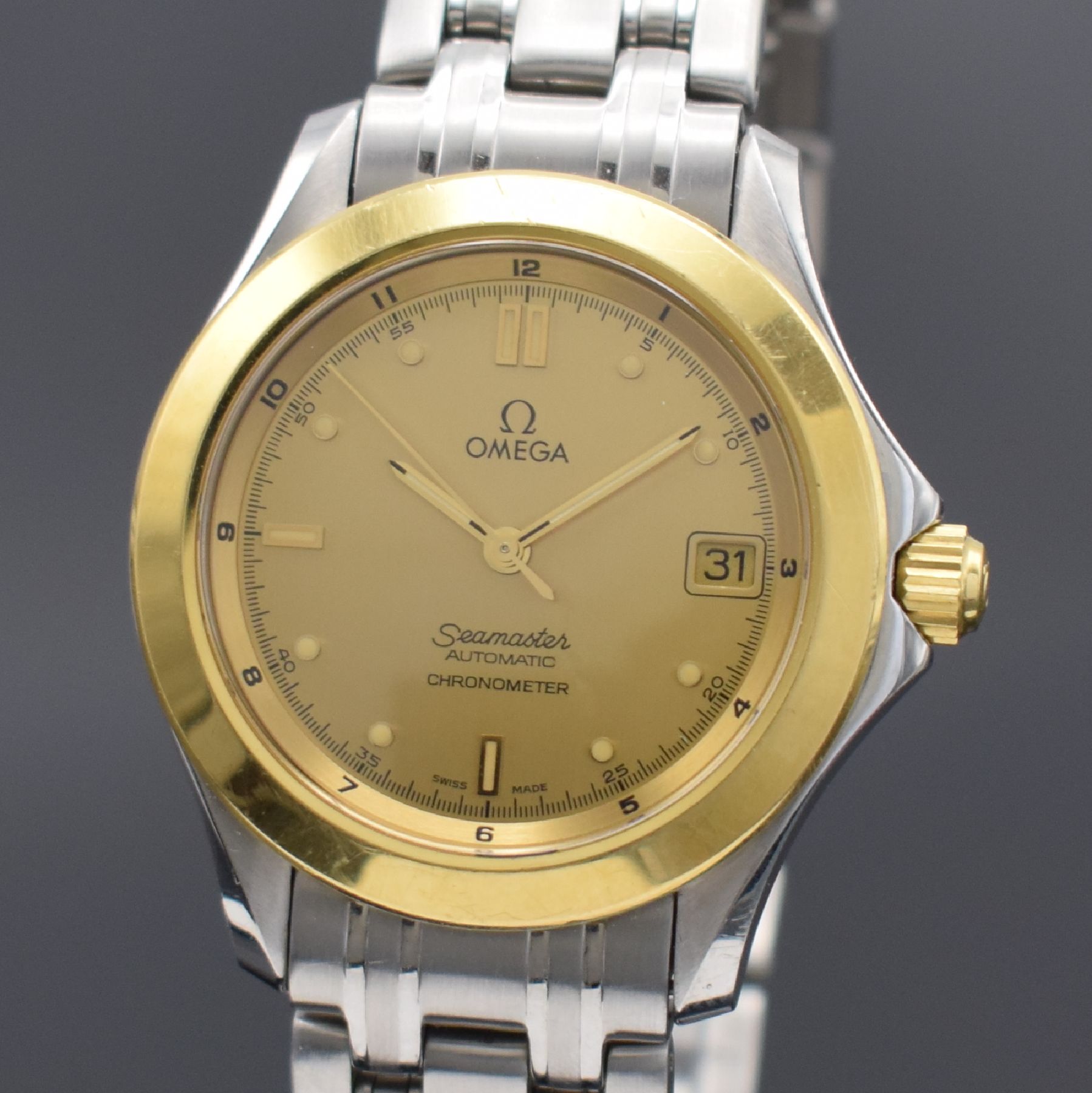 Detail a: OMEGA Seamaster Chronometer Herrenarmbanduhr in Stahl/Gold Referenz 196.1501, Schweiz um 1995, verkauft lt. beiliegender Garantiekarte am 7.12.2017, ...