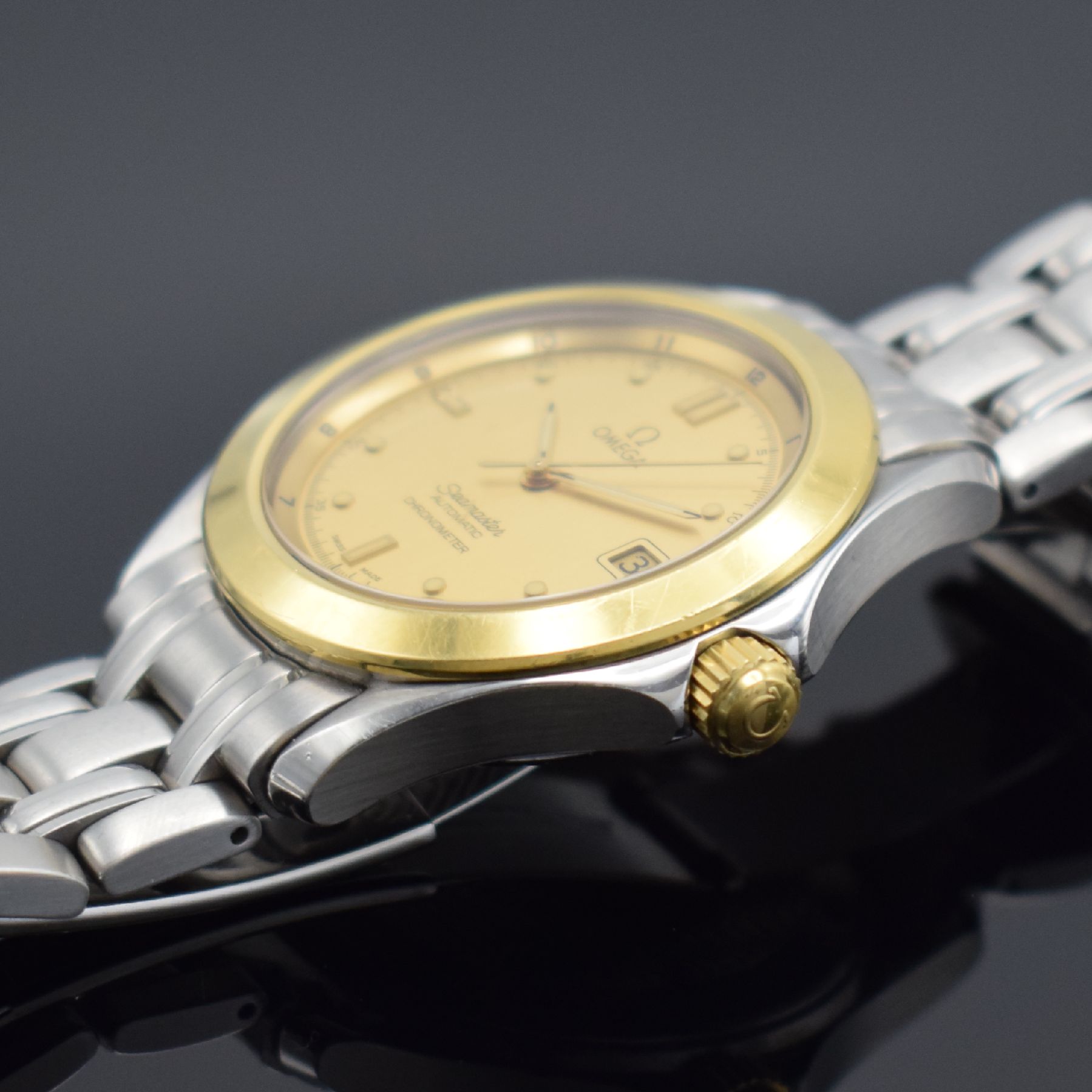 Detail d: OMEGA Seamaster Chronometer Herrenarmbanduhr in Stahl/Gold Referenz 196.1501, Schweiz um 1995, verkauft lt. beiliegender Garantiekarte am 7.12.2017, ...