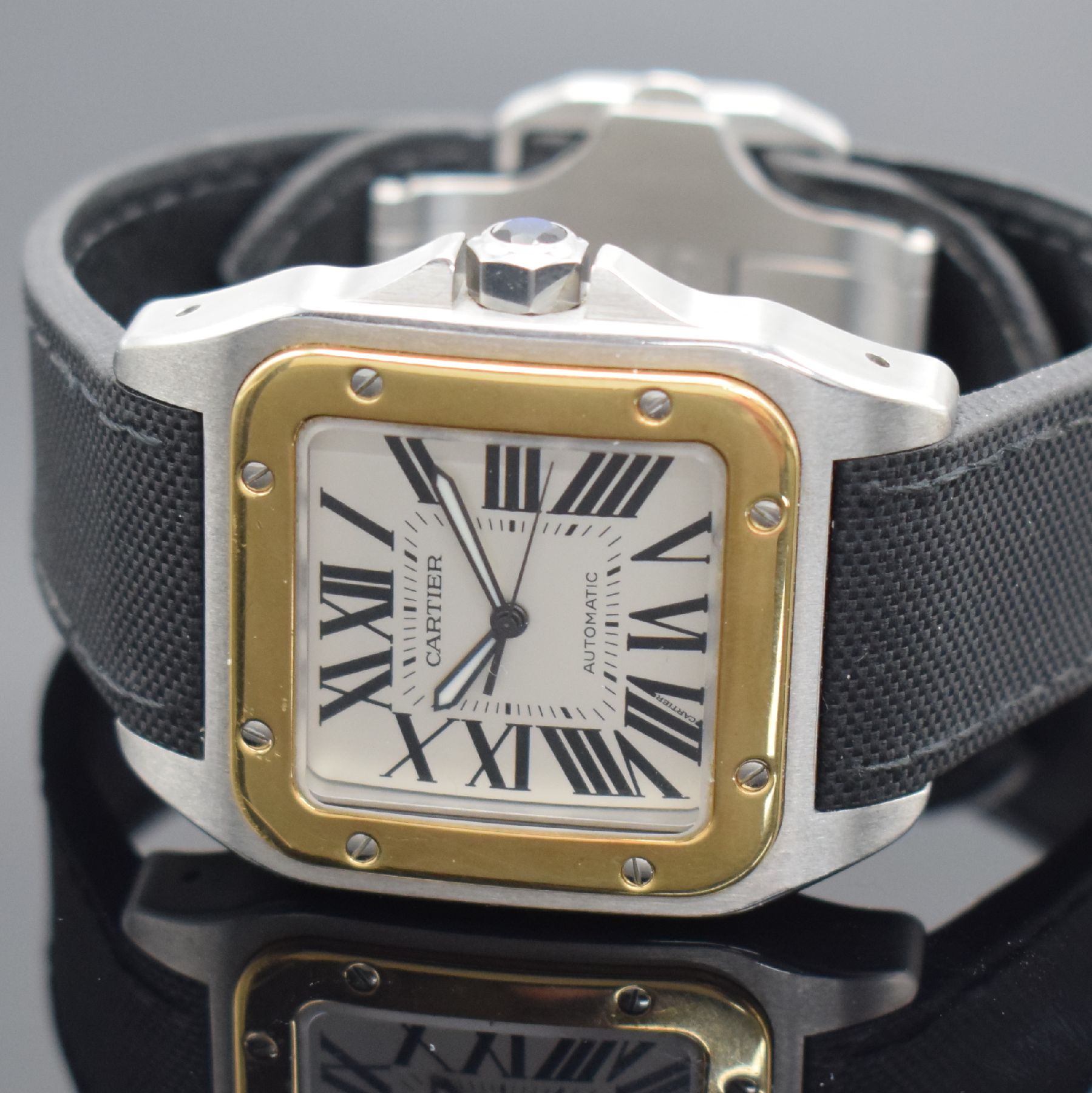 Detail b: CARTIER Santos 100 XL große Herrenarmbanduhr, Schweiz verk. lt. beil. Pap. 10/2005, Automatik, Ref. W20072X7, massives Geh. in Edelstahl/Gold komb. ...