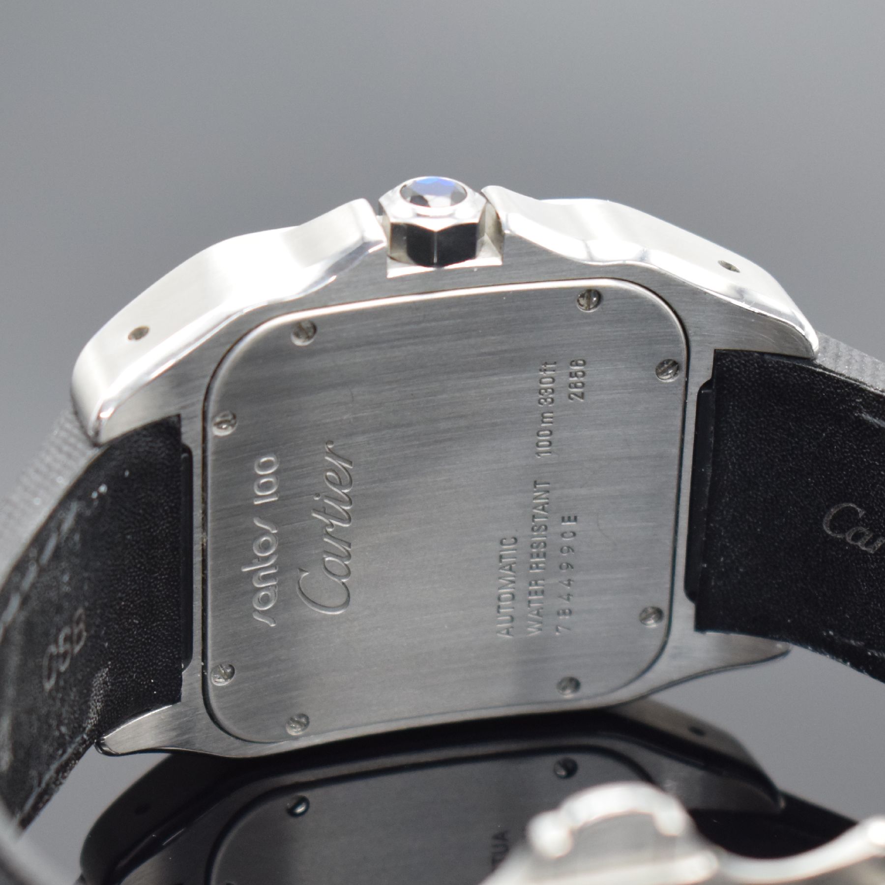 Detail e: CARTIER Santos 100 XL große Herrenarmbanduhr, Schweiz verk. lt. beil. Pap. 10/2005, Automatik, Ref. W20072X7, massives Geh. in Edelstahl/Gold komb. ...