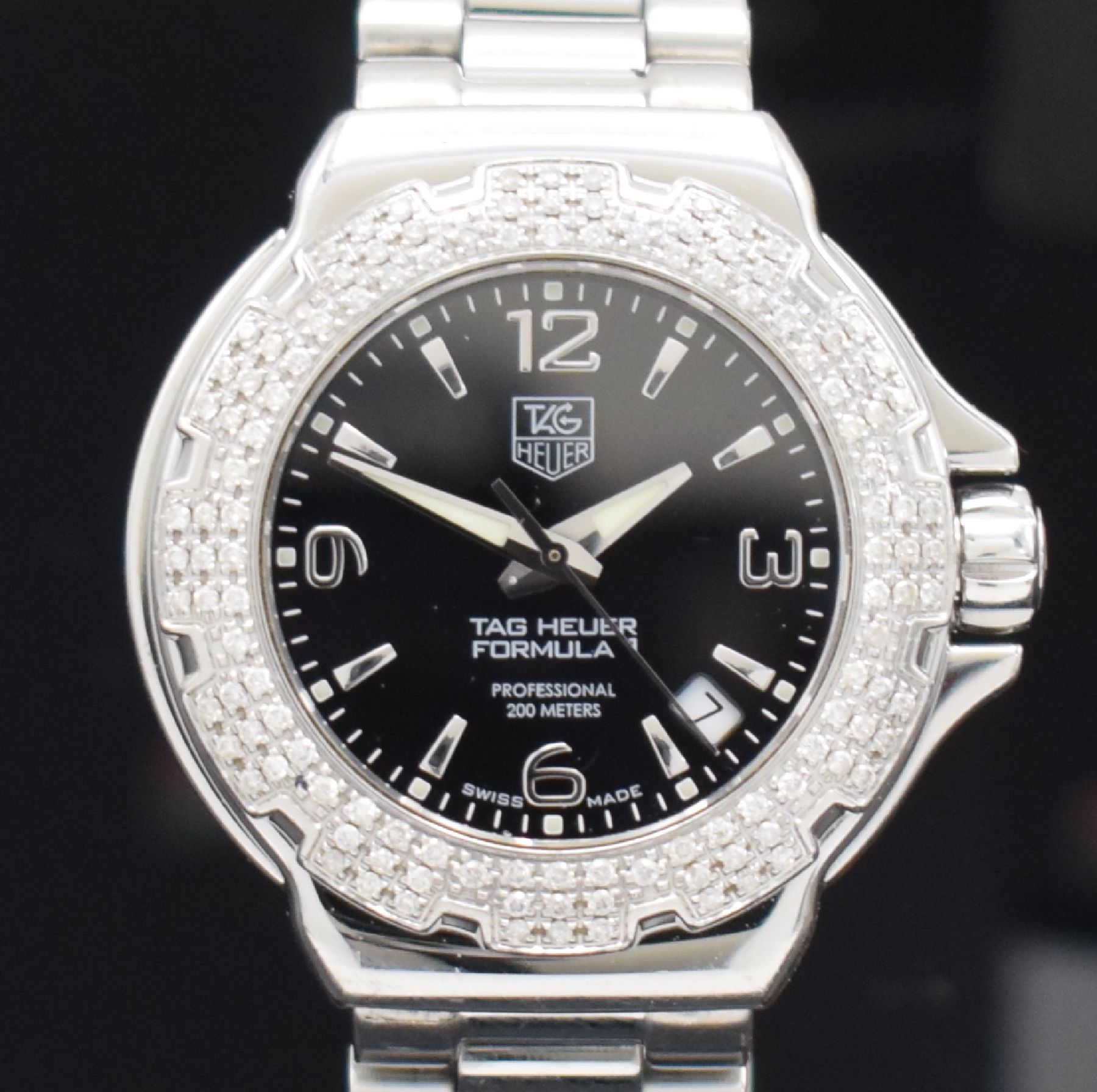 Detail b: TAG HEUER Formula 1 Damenarmbanduhr mit Brillantlünette Referenz WAC1214-0, quarz, Edelstahlgeh. inkl. Gliederband m. Faltschl. & ...